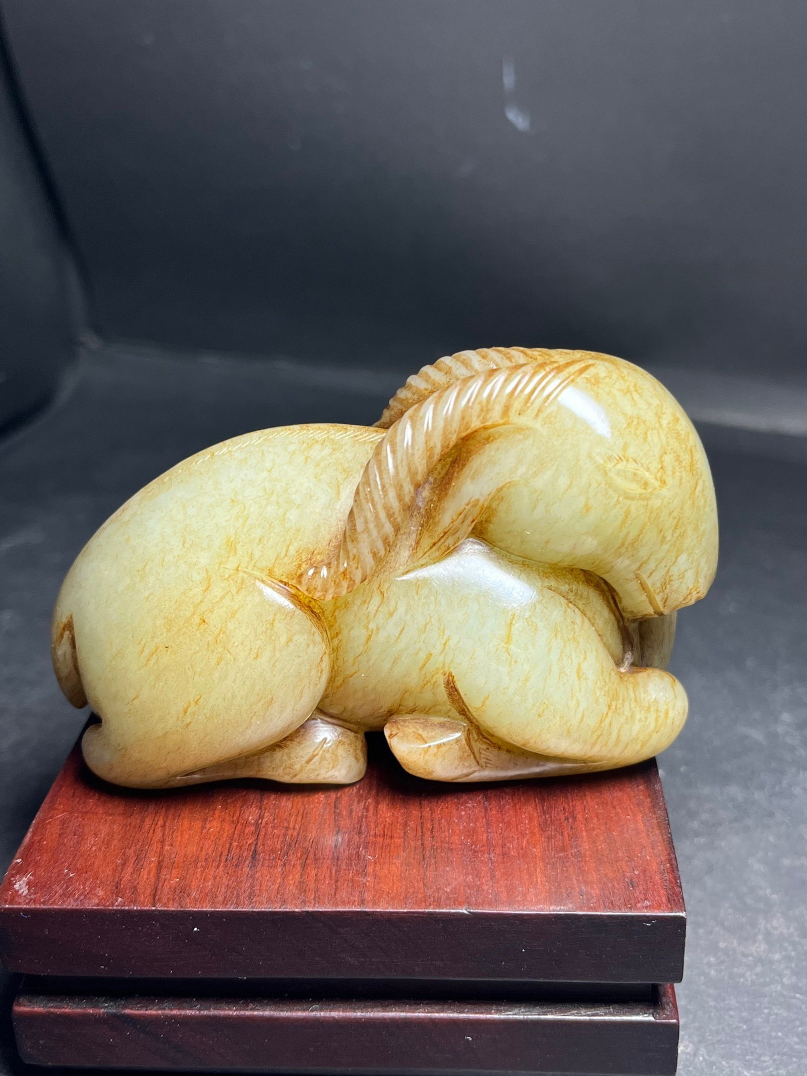 An Exquisite White Jade Sheep Hand Piece: Estimated Value:1800-3600 An Exquisite White Jade Sheep Hand Piece,Qing Dynasty,China,Size:86mmx45mmx54mm,Weight:279g 白玉羊手把件,中国清代