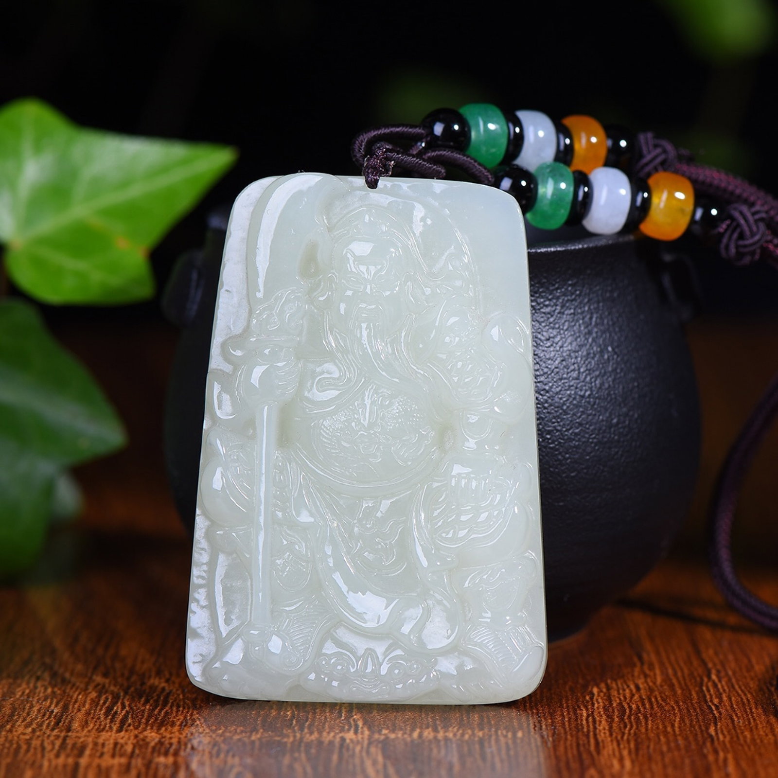 An Exquisite White Jade Guangong Pattern Pendant: Estimated Value:880-1760 An Exquisite White Jade Guangong Pattern Pendant,Size:40mmx59mm (寓意)保佑平安的护法珈蓝
