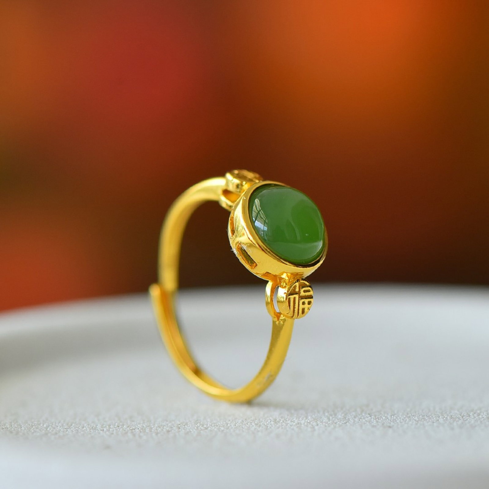 An Exquisite Sterling Silver-Gold Plated Inlaid Jasper Ring: Estimated Value:200-400 An Exquisite Sterling Silver-Gold Plated Inlaid Jasper Ring,Size:8mmx8mm 纯银镀金镶碧玉戒指