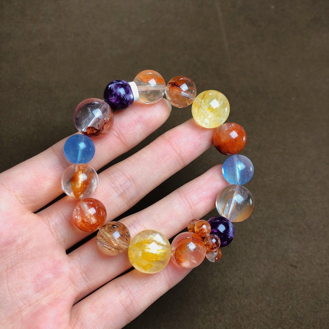 An Exquisite Multi-Gem Bracelets: Estimated Value:1200-2400 An Exquisite Multi-Gem Bracelets,Size:11.9mm,14.5mm,Weight:42.3g 多宝手串