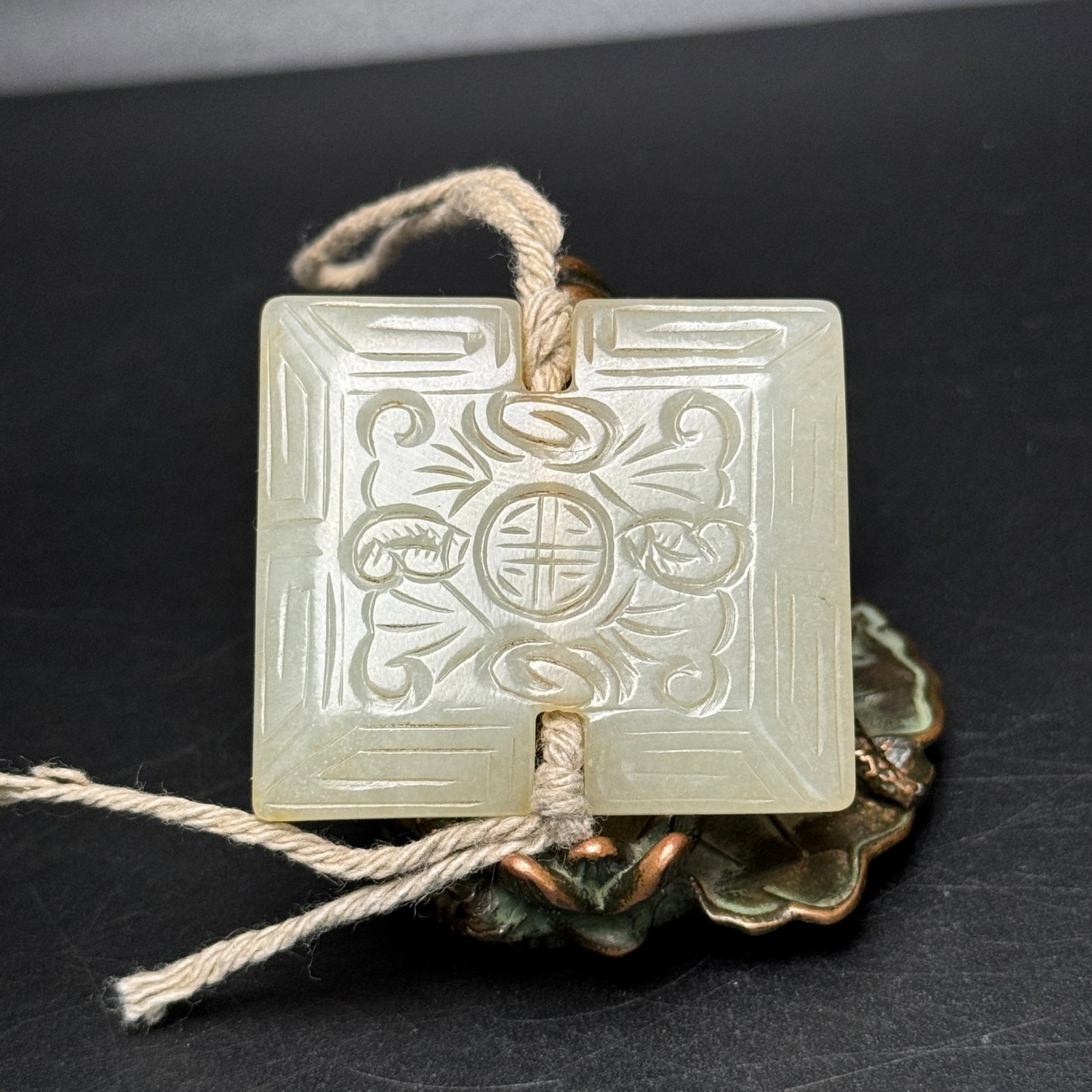 An Exquisite White Jade Shou-Character Pattern Pendant: Estimated Value:380-760 An Exquisite White Jade Shou-Character Pattern Pendant,Qing Dynasty,China,Size:39mmx44mmx7mm,Weight:26g