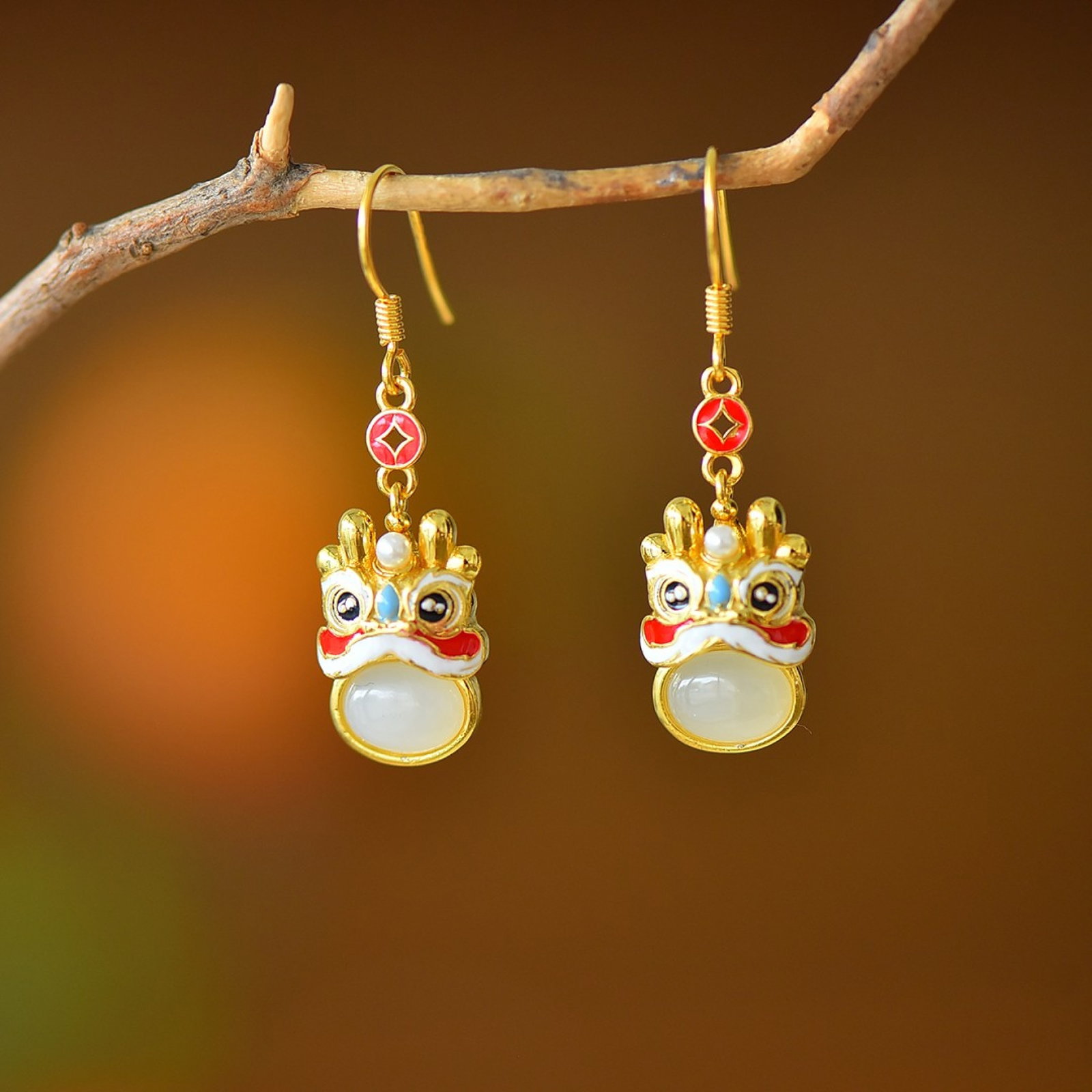 A Pair of Exquisite Sterling Silver-Gold Plated Inlaid White Jade Earrings: Estimated Value:200-400 A Pair of Exquisite Sterling Silver-Gold Plated Inlaid White Jade Earrings,Size:6mmx8mm 一对纯银镀金镶白玉耳环