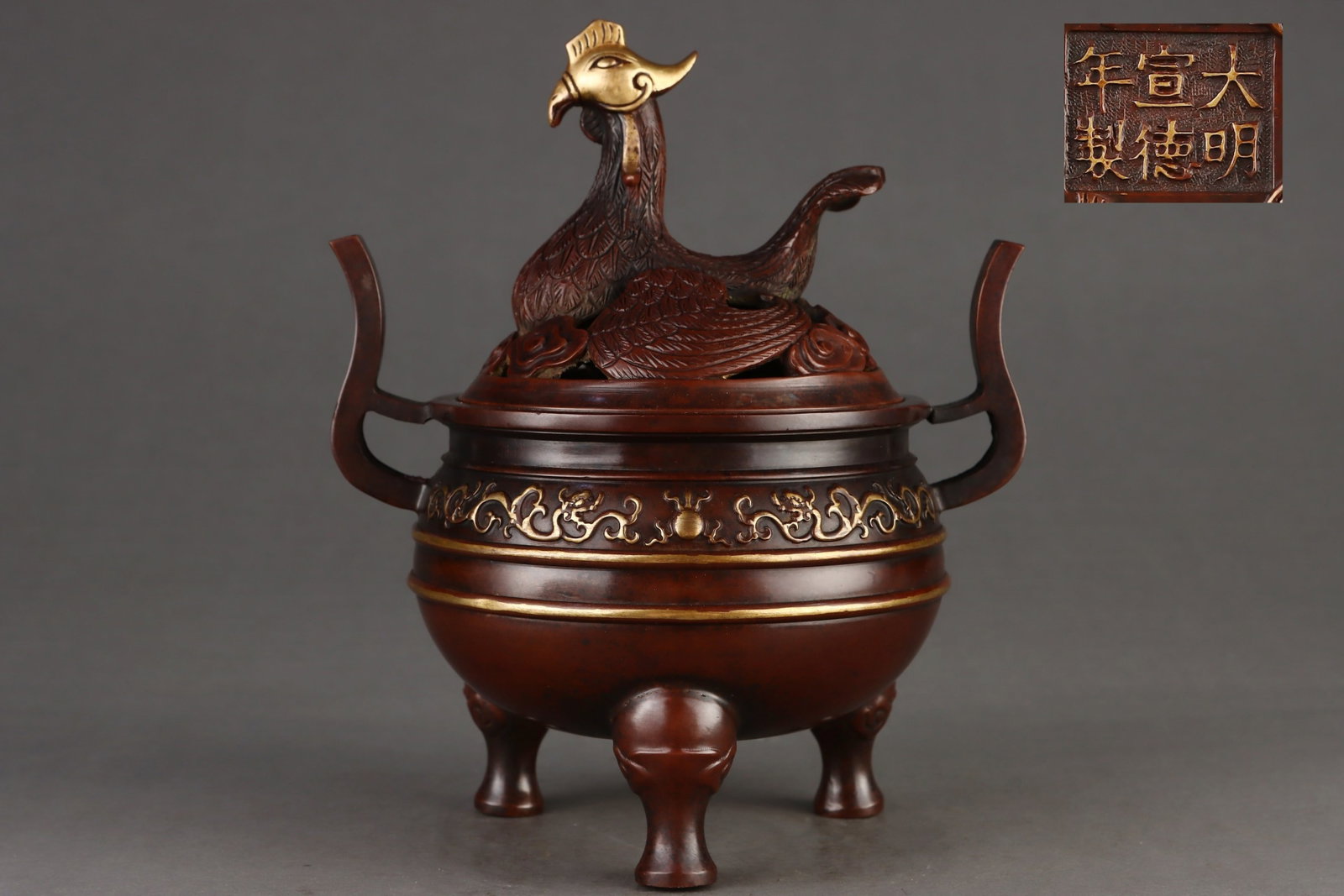 An Exquisite Gilt Bronze Dragon Pattern Double-Ears Tripod Censer,With Phoenix Cover: Estimated Value:1600-3200 An Exquisite Gilt Bronze Dragon Pattern Double-Ears Tripod Censer,With Phoenix Cover,Ming Dynasty,China,Xuande Six-character Mark,Size:9.4inx5.6inx6.3inx7.9in,Weight:3650g &#