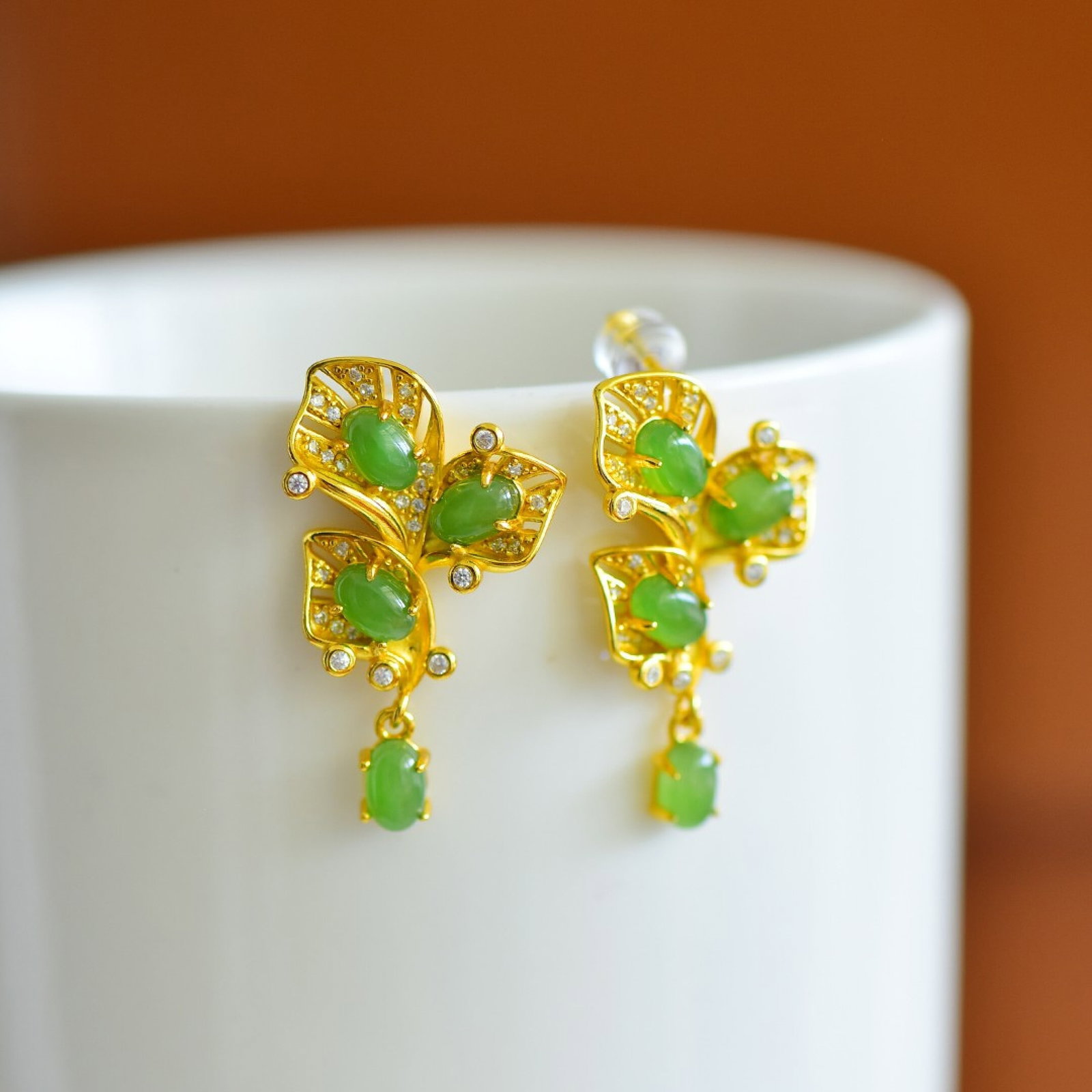 A Pair of Exquisite Sterling Silver-Gold Plated Inlaid Jasper Earrings,Inlaid Diamonds: Estimated Value:300-600 A Pair of Exquisite Sterling Silver-Gold Plated Inlaid Jasper Earrings,Inlaid Diamonds,Size:4mmx6mm