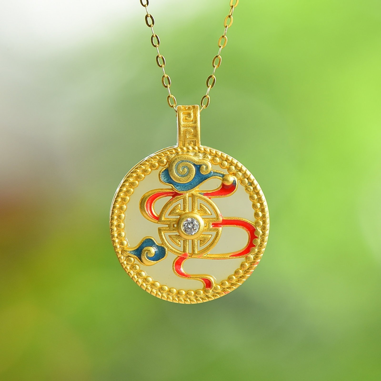 An Exquisite Sterling Silver-Gold Plated Inlaid White Jade Pendant: Estimated Value:300-600 An Exquisite Sterling Silver-Gold Plated Inlaid White Jade Pendant 纯银镀金镶白玉吊坠