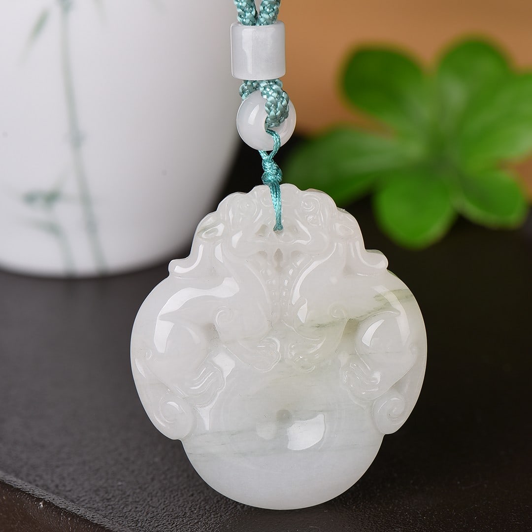 An Exquisite White Jade Auspicious Beast Pendant - 2