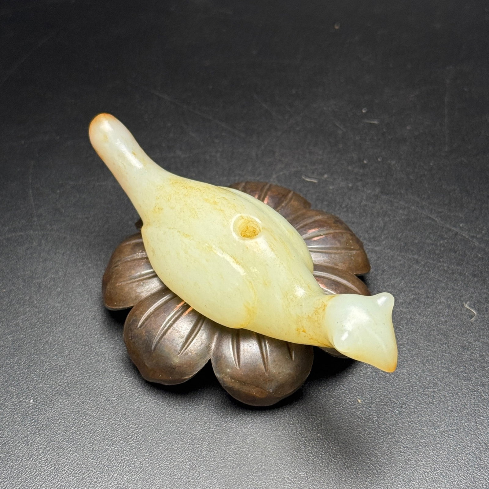 An Exquisite White Jade Bird Pendant: Estimated Value:800-1600 An Exquisite White Jade Bird Pendant,Qing Dynasty,China,Size:90mmx29mmx20mm,Weight:51g 白玉鸟挂件,中国清代