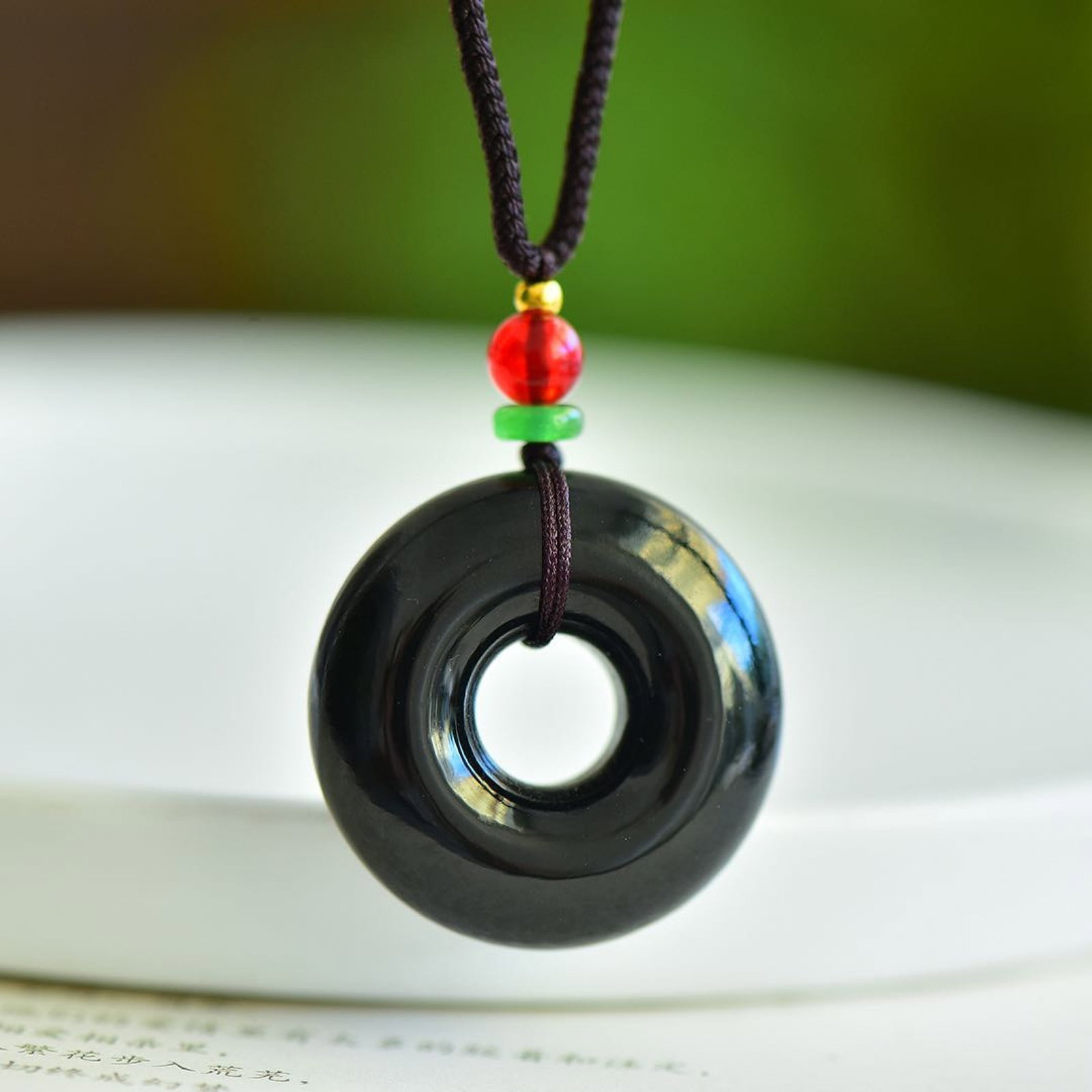 An Exquisite Sapphire Pendant: Estimated Value:200-400 An Exquisite Sapphire Pendant,Size:30mmx10mm 青玉吊坠