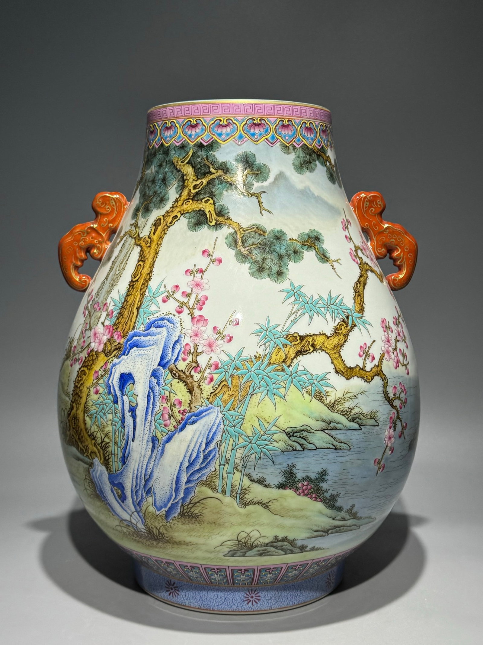 A Rare Famille-Rose Painted Gold Pine,Bamboo and Plum Blossom Pattern Double-Ears Vase,With Poem: Estimated Value:8000-16000 A Rare Famille-Rose Painted Gold Pine,Bamboo and Plum Blossom Pattern Double-Ears Vase,With Poem,Qing Dynasty,China,Qianlong Six-character Mark,Size:14.4inx11.2in 粉&#