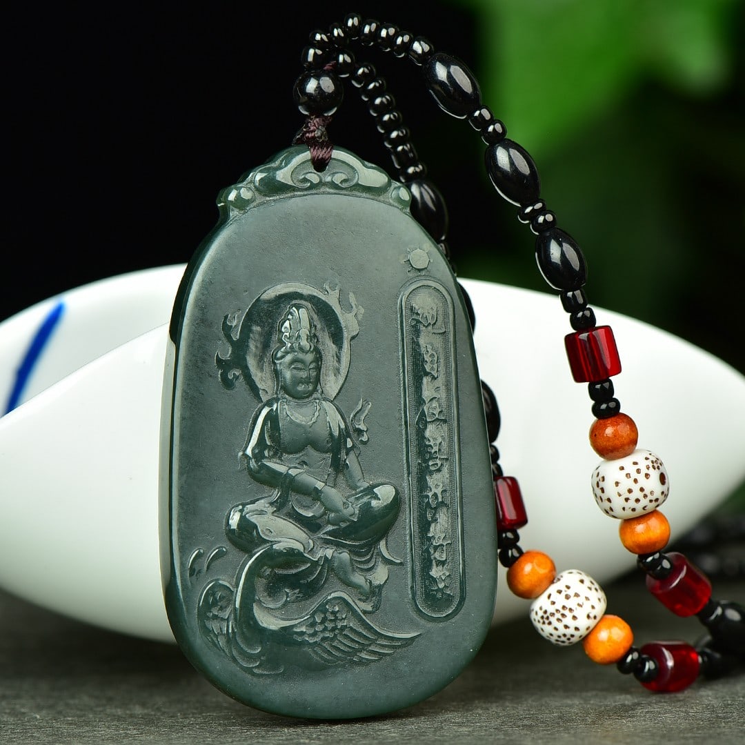 An Exquisite Sapphire Avalokitesvara Pattern Pendant: Estimated Value:400-800 An Exquisite Sapphire Avalokitesvara Pattern Pendant,Size:40mmx66mm 寓意:吉祥 保平安 玉脂温润