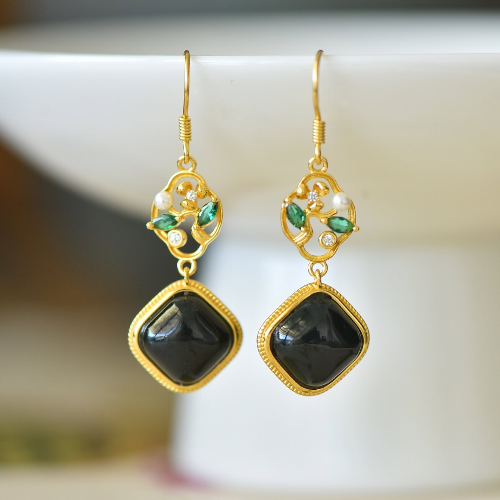 A Pair of Exquisite Sterling Silver-Gold Plated Inlaid Black Jade Earrings,Inlaid Diamond: Estimated Value:300-600 A Pair of Exquisite Sterling Silver-Gold Plated Inlaid Black Jade Earrings,Inlaid Diamond,Size:10mmx10mm