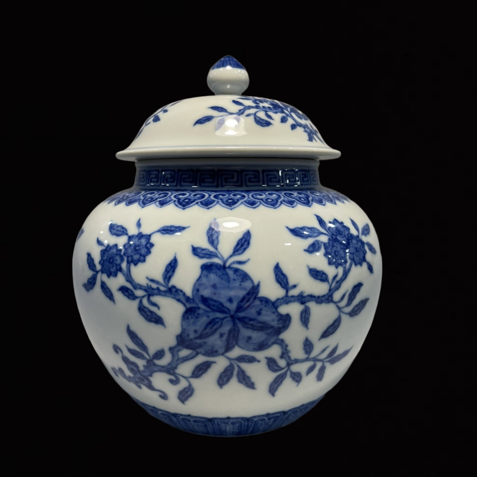 An Exquisite Blue and White Flower and Fruit Pattern Jar with Cover: An Exquisite Blue and White Flower and Fruit Pattern Jar with Cover,Qing Dynasty,China,Qianlong Six-character Mark,Size:7.3inx6.3in