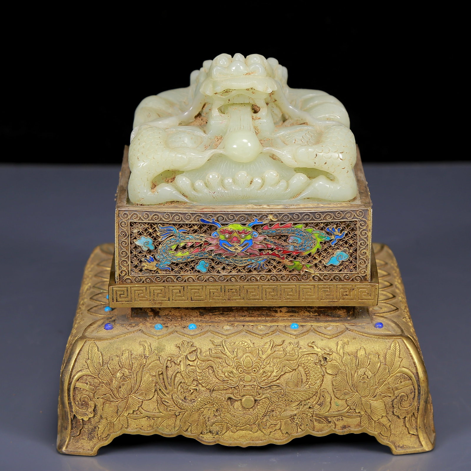 An Exquisite Gilt Bronze Inlaid White Jade Dragon Pattern Seal: An Exquisite Gilt Bronze Inlaid White Jade Dragon Pattern Seal,Qing Dynasty, China, Qianlong Four-character Mark,Size:6.7inx5.9inx6.9in,Weight:3535g