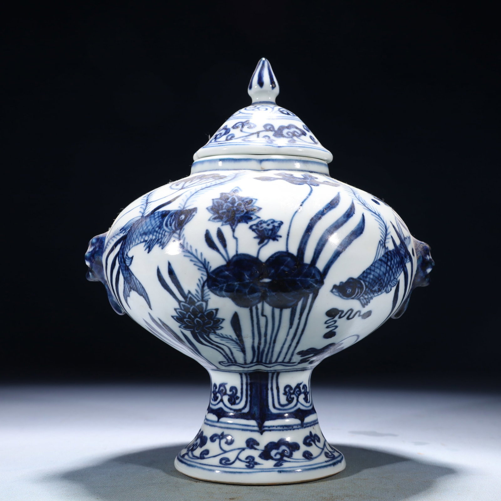 An Exquisite Blue and White Hornwort Pattern Beast-Ears Jar with Cover: An Exquisite Blue and White Hornwort Pattern Beast-Ears Jar with Cover,Ming Dynasty,China,Xuande Six-character Mark,Size:7.5inx6.7inx9.1in,Weight:1500g
