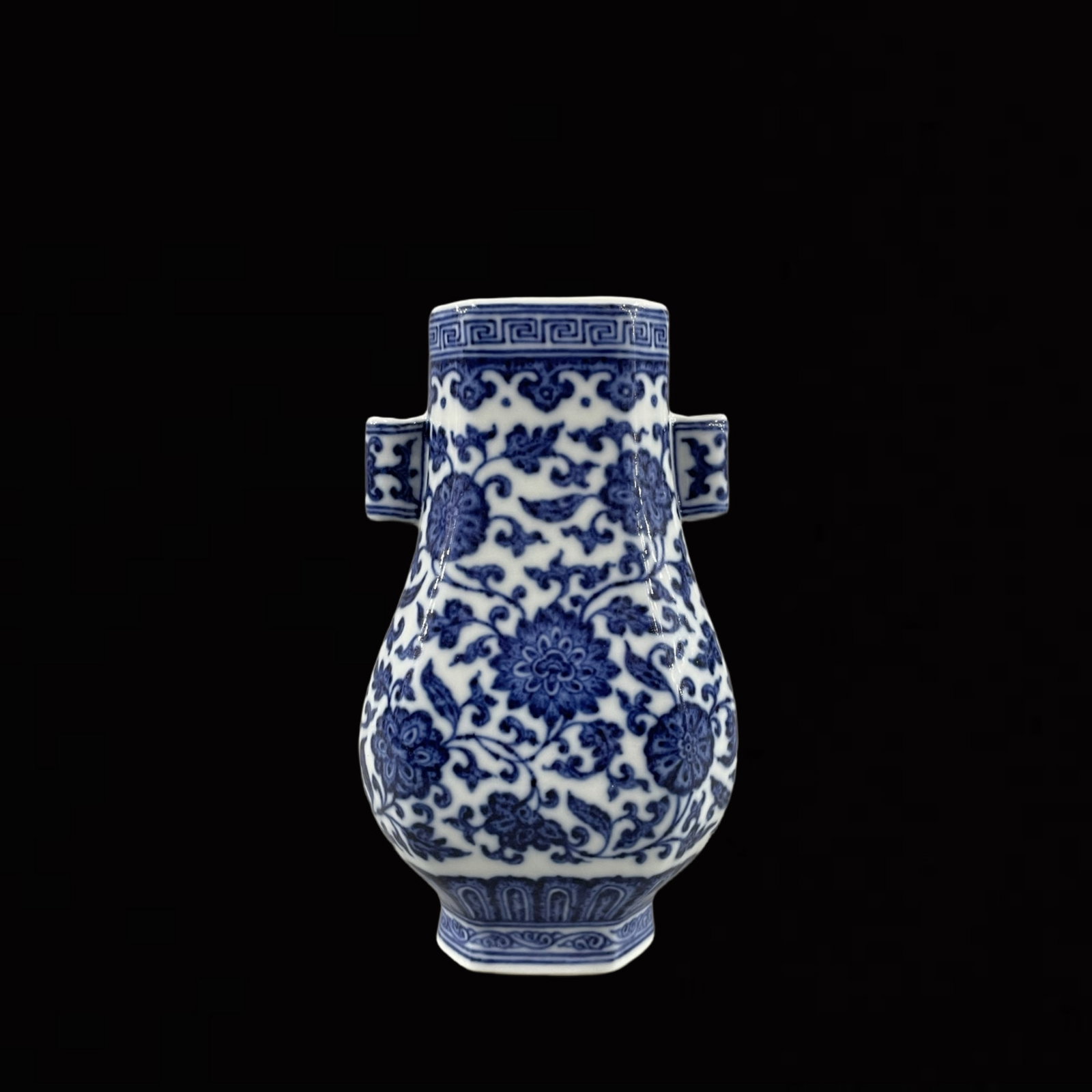 An Exquisite Blue and White Lotus Pattern Double-Ears Vase: An Exquisite Blue and White Lotus Pattern Double-Ears Vase,Qing Dynasty,China,Qianlong Six-character Mark,Size:5.5inx3.1in