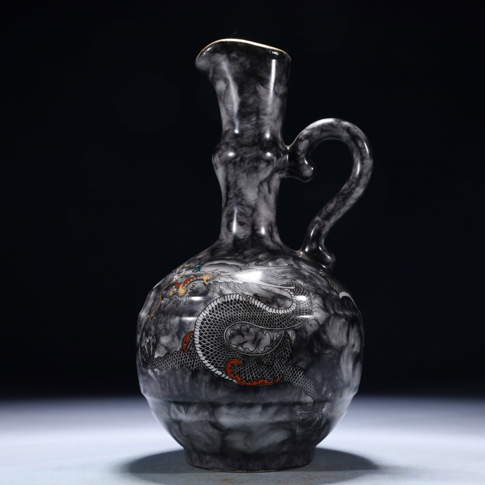 An Exquisite Ink Color Auspicious Cloud and Dragon Pattern Ewer: An Exquisite Ink Color Auspicious Cloud and Dragon Pattern Ewer,Qing Dynasty,China,Qianlong Six-character Mark,Size:5.1inx9.8in,Weight:900g 墨彩祥云龙纹执