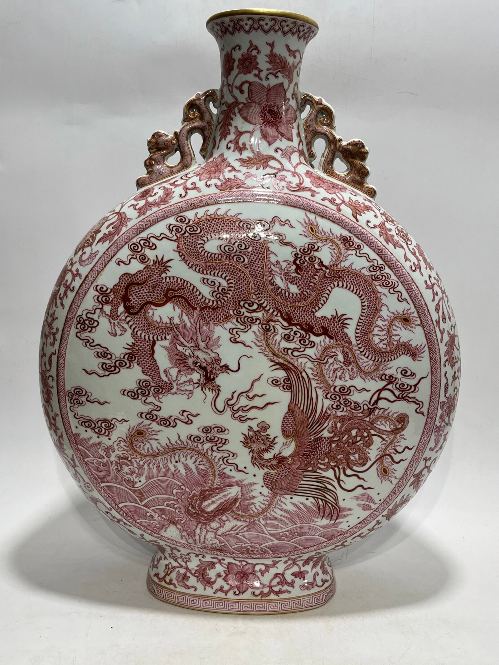 A Huge Ruby Red-Glazed Auspicious Cloud and Dragon Pattern Dragon-Ears Vase: A Huge Ruby Red-Glazed Auspicious Cloud and Dragon Pattern Dragon-Ears Vase,Qing Dynasty,China,Qianlong Six-character Mark,Size:22.8in