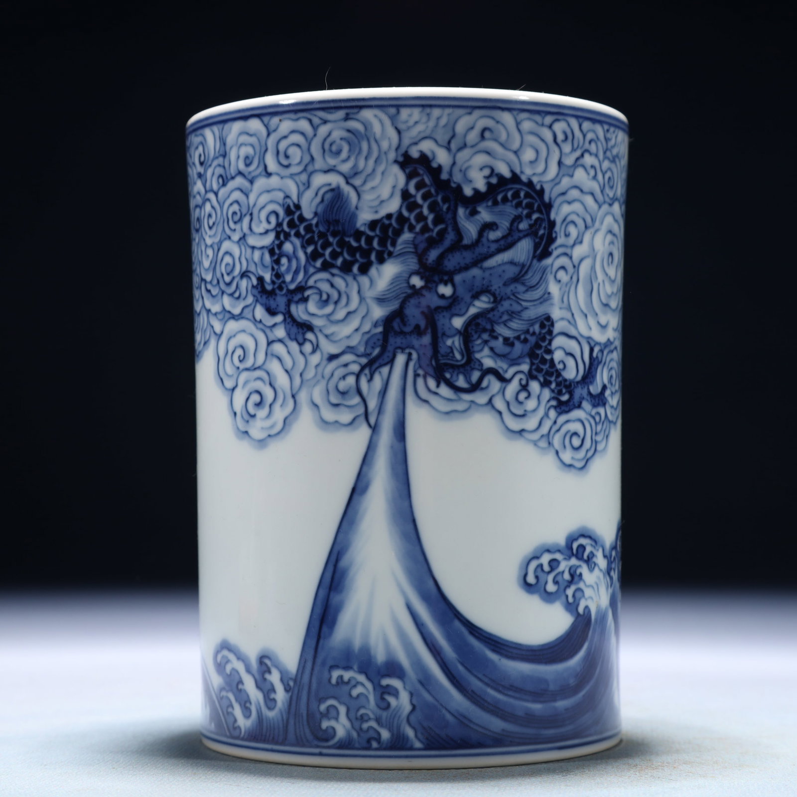An Exquisite Blue and White Auspicious Cloud and Dragon Pattern Brush Pot,with poem: An Exquisite Blue and White Auspicious Cloud and Dragon Pattern Brush Pot,with poem,Qing Dynasty,China,Yongzheng Six-character Mark,Size:3.7inx5.3in,Weight:450g