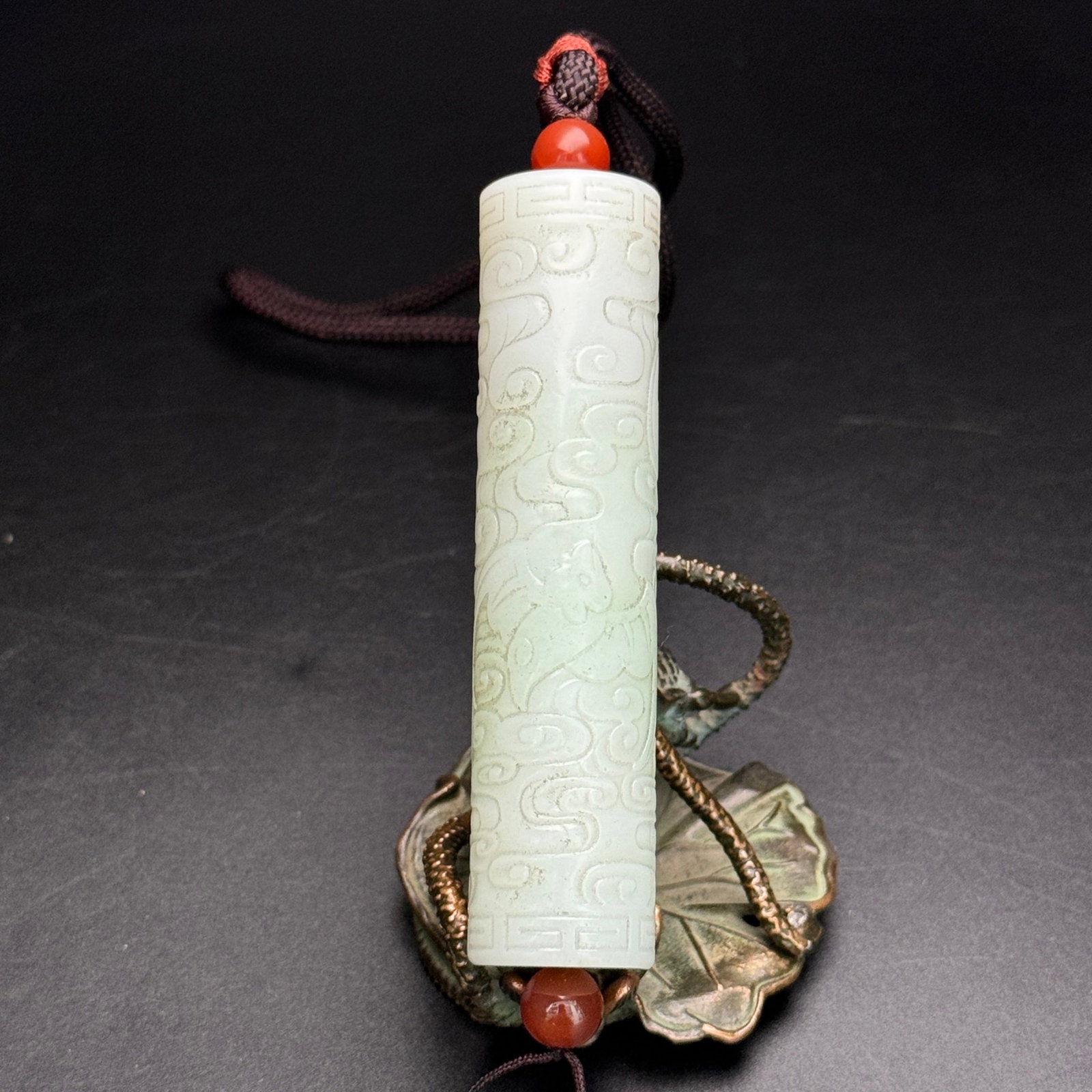 An Exquisite White Jade Auspicious Cloud and Bats Pattern Pendant: An Exquisite White Jade Auspicious Cloud and Bats Pattern Pendant,Qing Dynasty,China,Size:0.7inx3.1in,Weight:65g