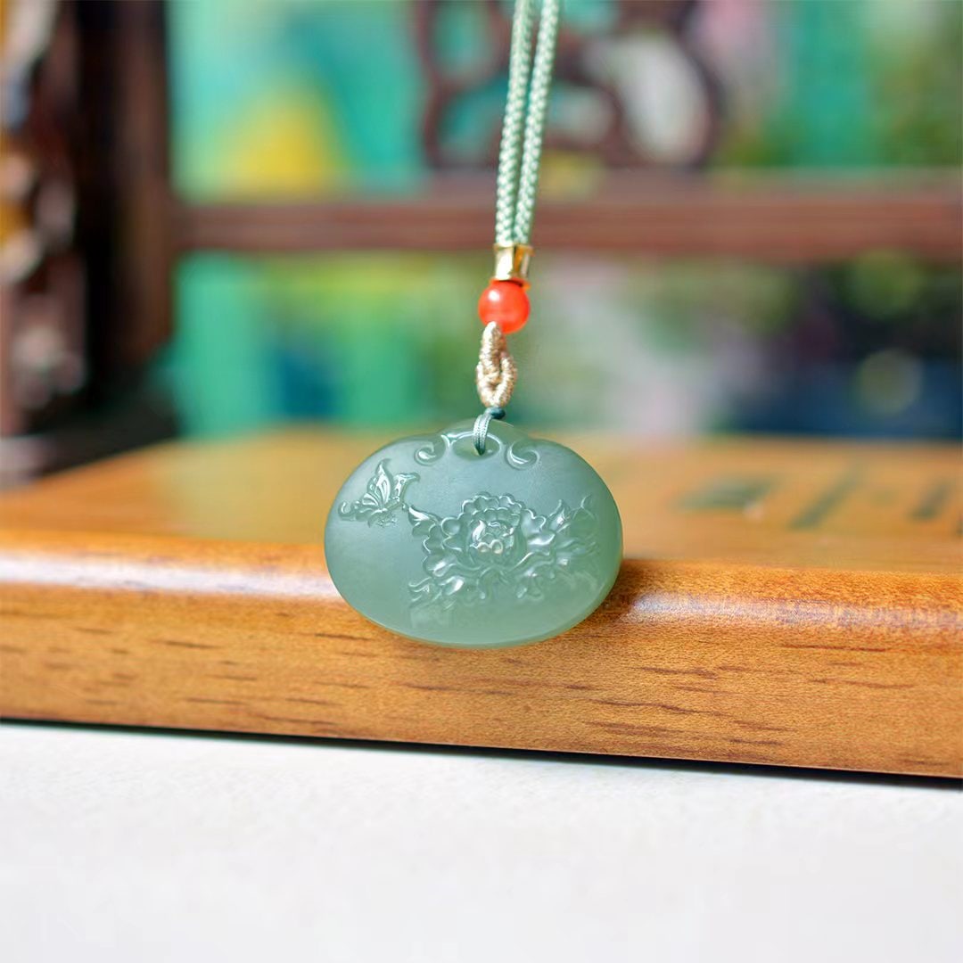 An Exquisite Greenish Jade Flower and Bird Pattern Pendant: An Exquisite Greenish Jade Flower and Bird Pattern Pendant,Size:1inx1.2in 青玉花鸟纹挂件