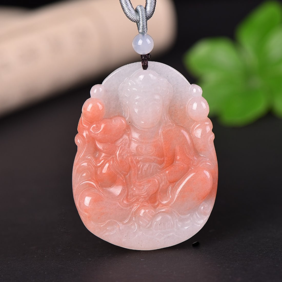 An Exquisite Red Jade Statue of Avalokitesvara Pendant (1 of 2)