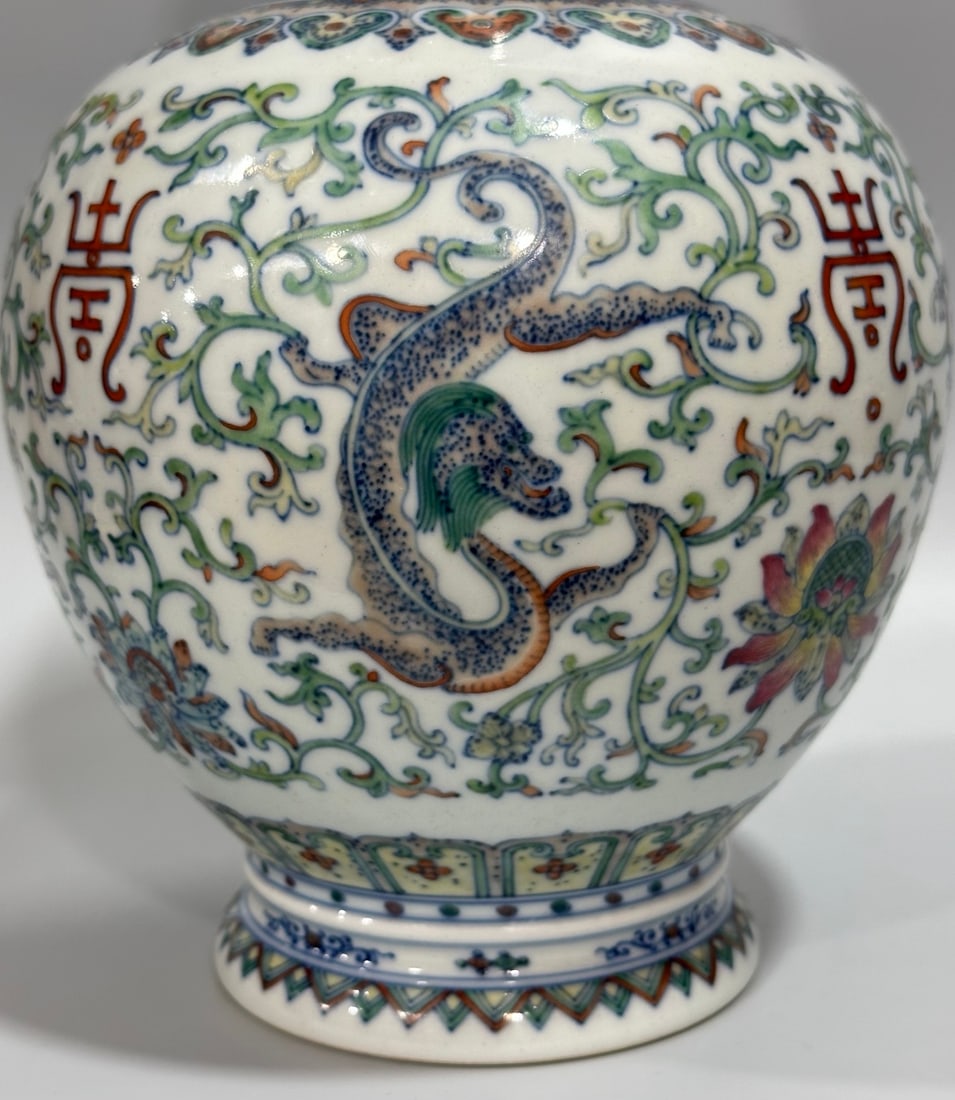 A Rare Blue and White Doucai Auspicious Cloud and Dragon Pattern Gourd-Shaped Vase: A Rare Blue and White Doucai Auspicious Cloud and Dragon Pattern Gourd-Shaped Vase,Qing Dynasty,China,Qianlong Six-character Mark,Size:12.6inx7.5in 青花斗彩祥云(