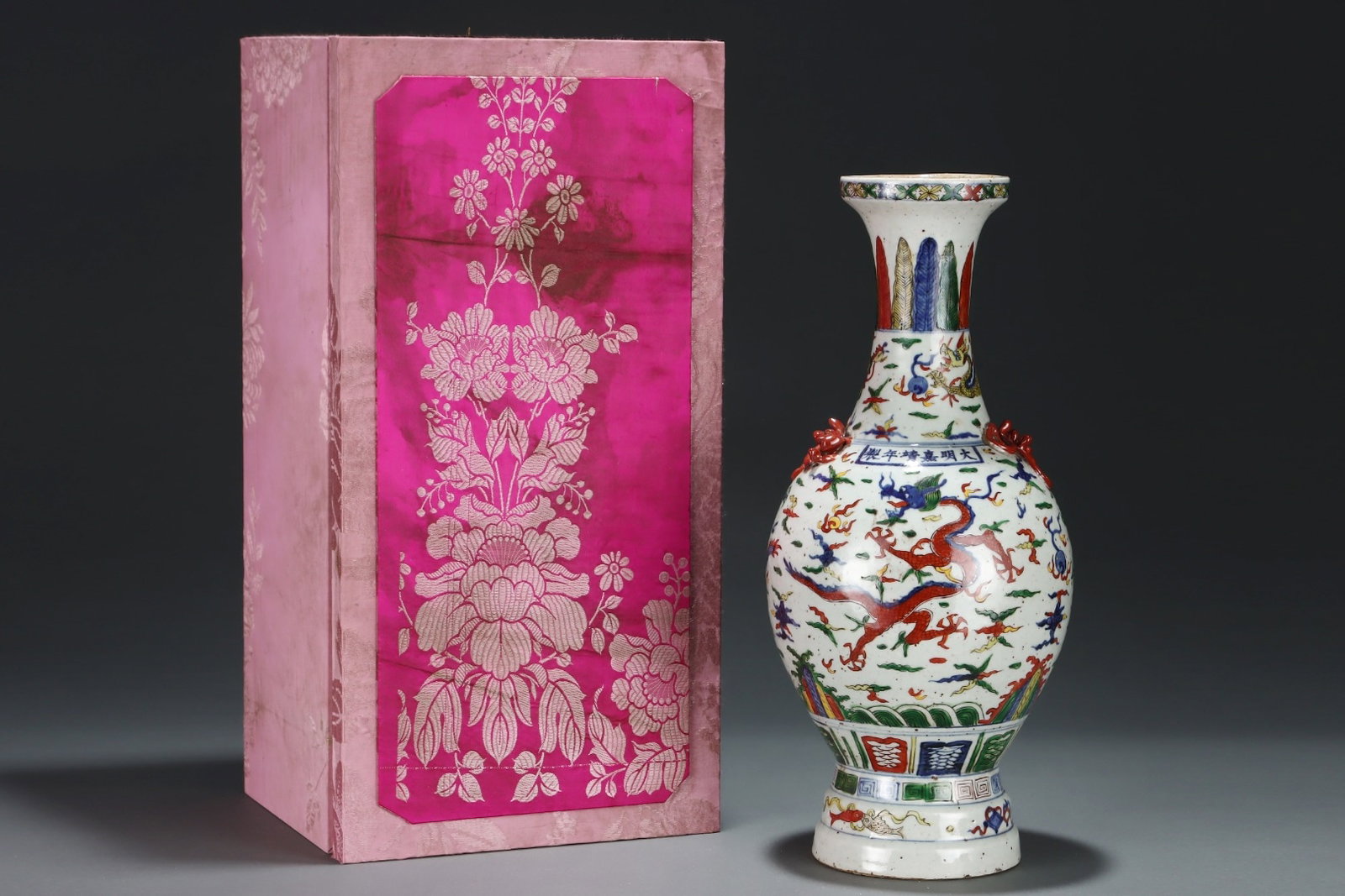 A Huge Blue and White Doucai Auspicious Cloud and Dragon Pattern Double-Ears Vase: A Huge Blue and White Doucai Auspicious Cloud and Dragon Pattern Double-Ears Vase,Ming Dynasty,China,Jiajing Six-character Mark,Size:16.5inx7.6in 青花斗彩祥云࿵