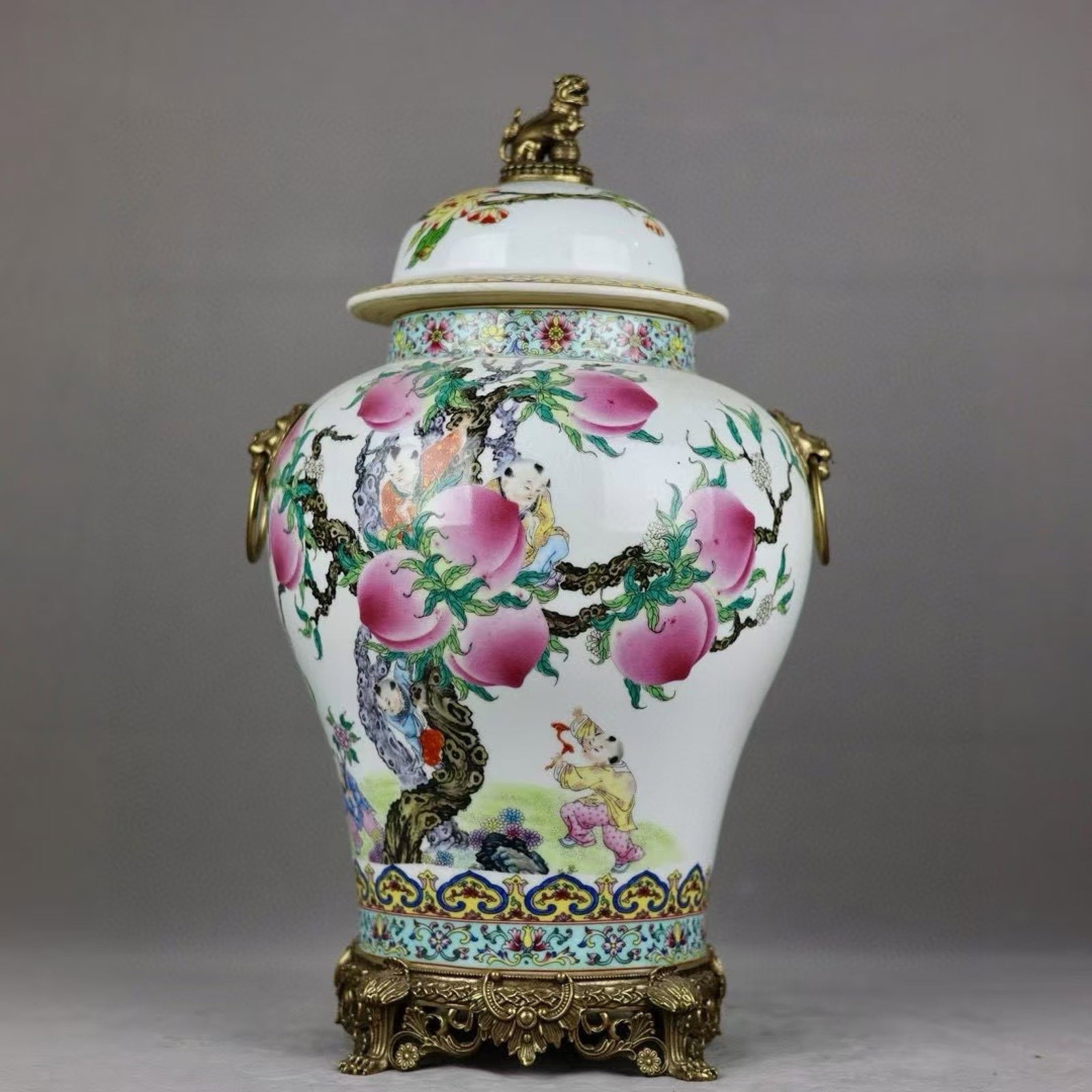 A Huge Famille-Rose Inlaid Bronze Figure and Peach Pattern Lion-Ears Cover Jars,With Poem: A Huge Famille-Rose Inlaid Bronze Figure and Peach Pattern Lion-Ears Cover Jars,With Poem,Qing Dynasty,China,Qianlong Four-character Mark,Size:20.5inx6.1inx11inx8.1in 粉彩镶铜&