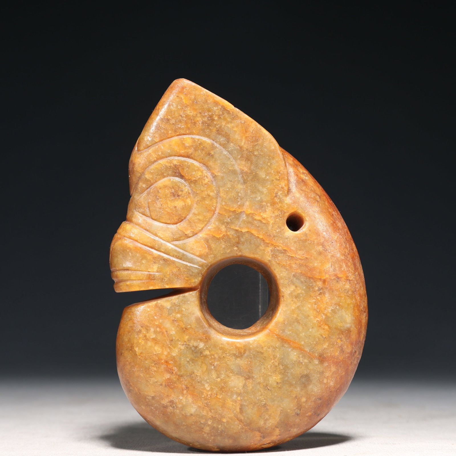 An Archaic Hongshan Culture Yellow Jade Pig and Dragon Ornament: An Archaic Hongshan Culture Yellow Jade Pig and Dragon Ornament,Ancient Time, China,Size:4.1inx9.8in Weight:850g 红山文化黄玉猪龙摆件,ߑ