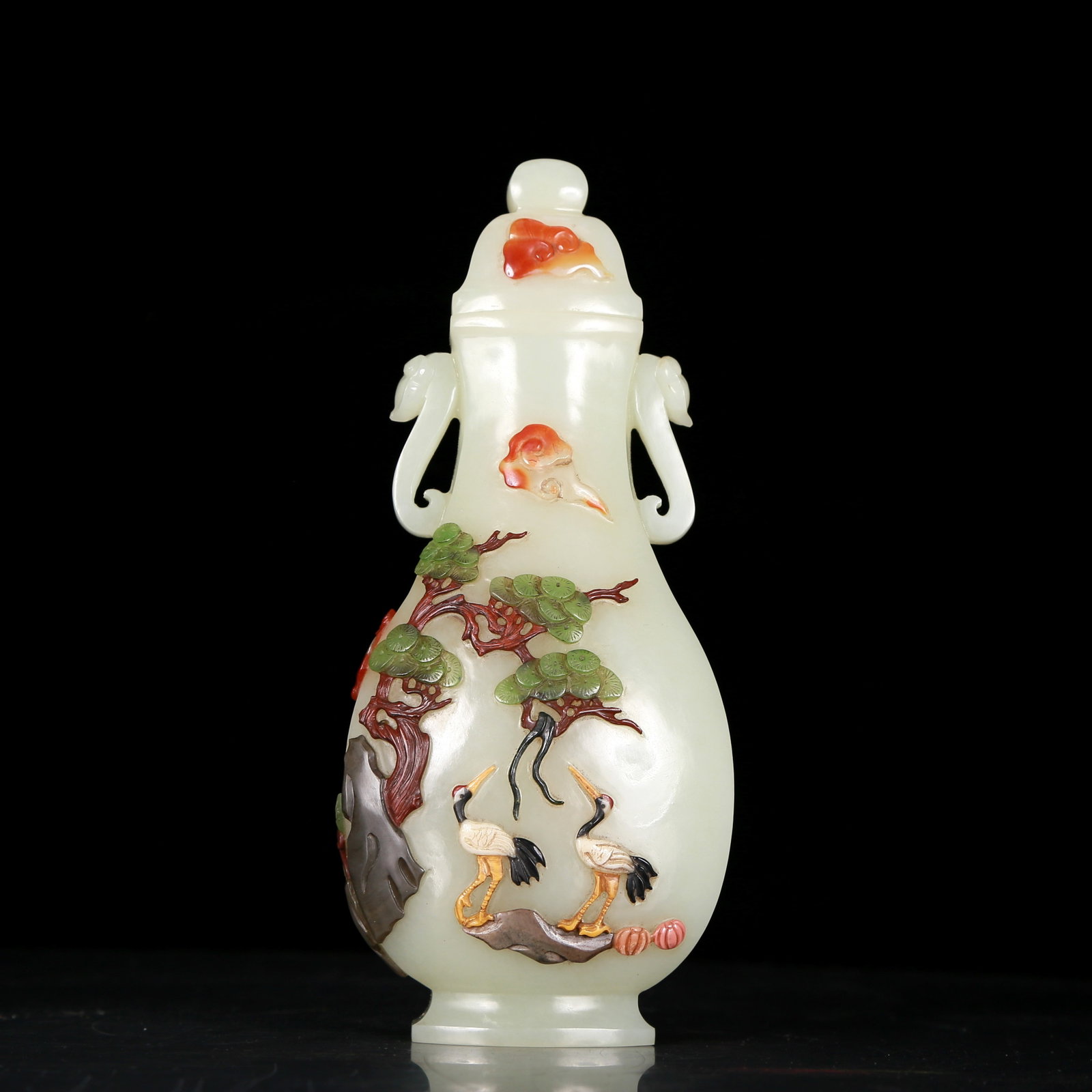 An exquisite white jade amphora with auspicious clouds and crane pattern with lid: An exquisite white jade amphorae with auspicious clouds and crane pattern and lid, Qing Dynasty, China, Qianlong four-character mark, Size: 3.1inx1.6inx7.5in, Weight: 315g 清代 乾