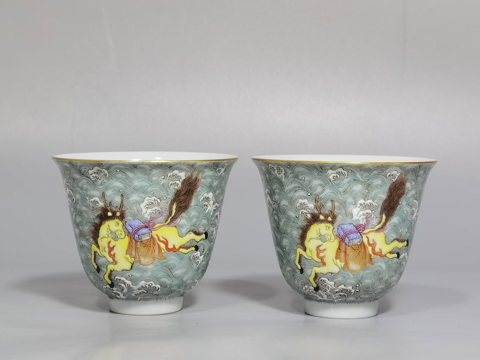 A Pair of Exquisite Famille-Rose Seawater and Horse Pattern Cups: A Pair of Exquisite Famille-Rose Seawater and Horse Pattern Cups,Qing Dynasty,China,Yongzheng Six-character Mark,Size:2.4inx2in 一对粉彩海水马纹杯