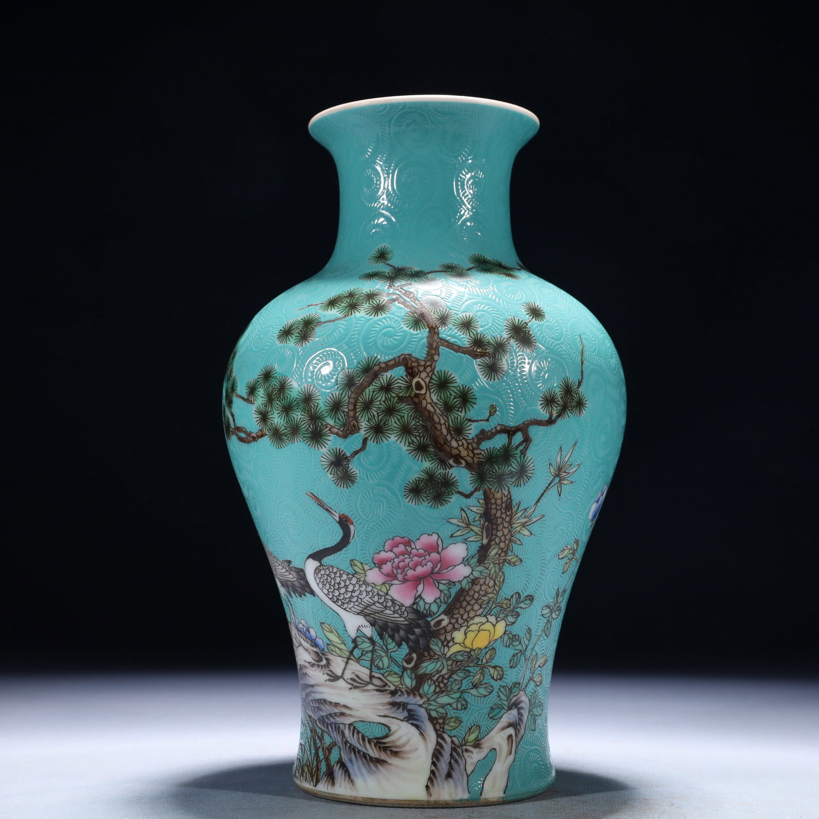 An Exquisite Turquoise Glazed Enamel Pine and Crane Pattern Vase: An Exquisite Turquoise Glazed Enamel Pine and Crane Pattern Vase,Qing Dynasty,China,Qianlong Six-character Mark,Size:5.1inx9.1in,Weight:950g 松石绿釉珐琅彩