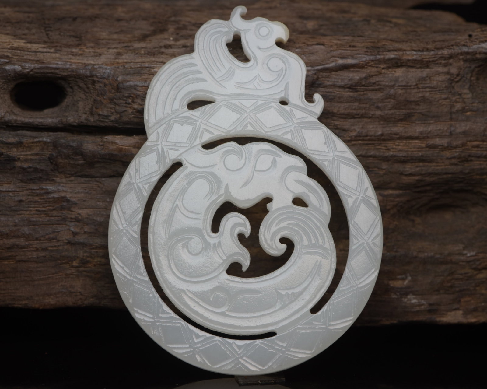 An Exquisite White Jade Dragon and Phoenix Pattern Pendant (1 of 9)