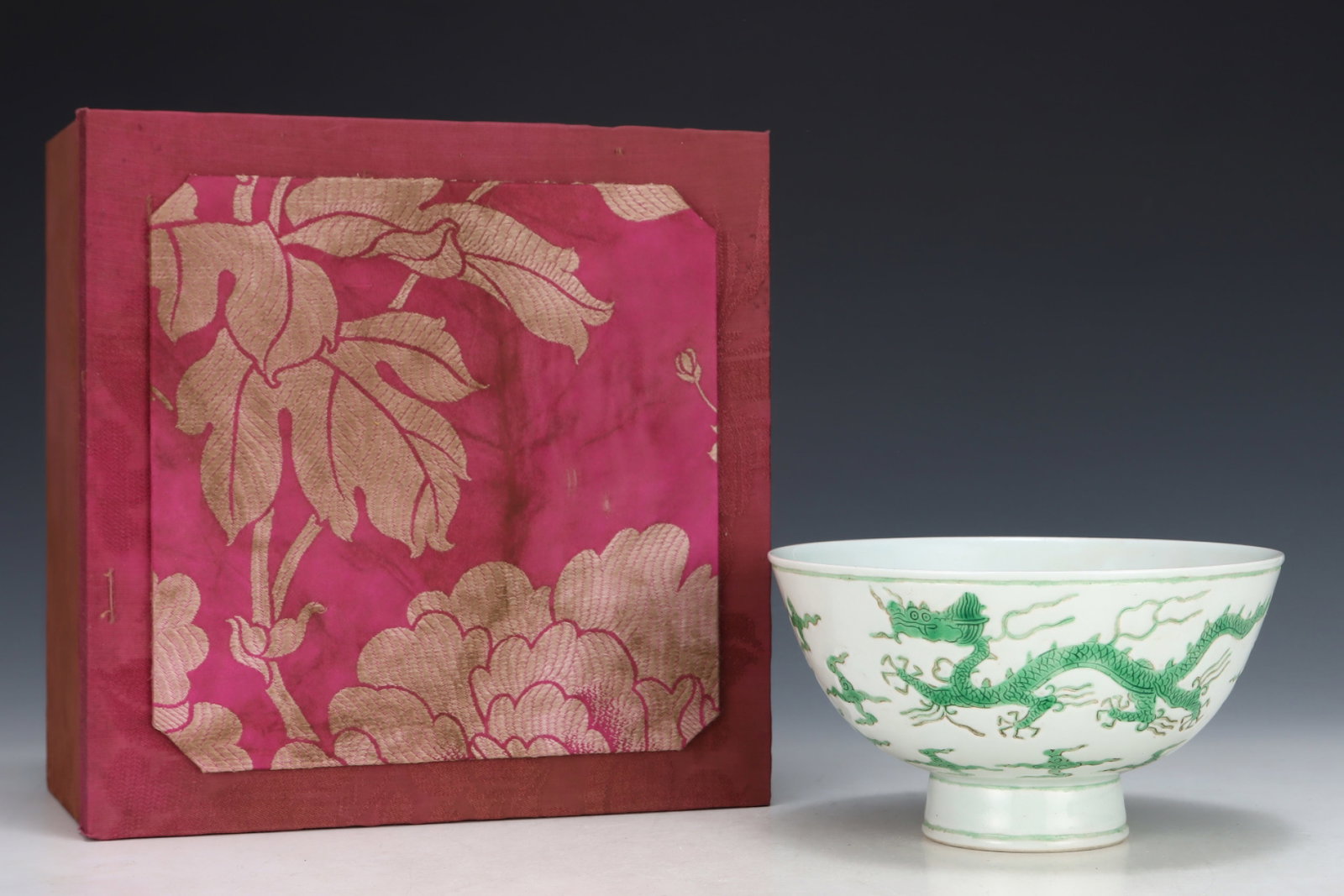 An Exquisite Green Glazed Auspicious Cloud and Dragon Pattern Bowl: An Exquisite Green Glazed Auspicious Cloud and Dragon Pattern Bowl,Ming Dynasty,China,Zhengde Four-character Mark,Size:3.6inx6.4in 绿釉祥云龙纹碗,中