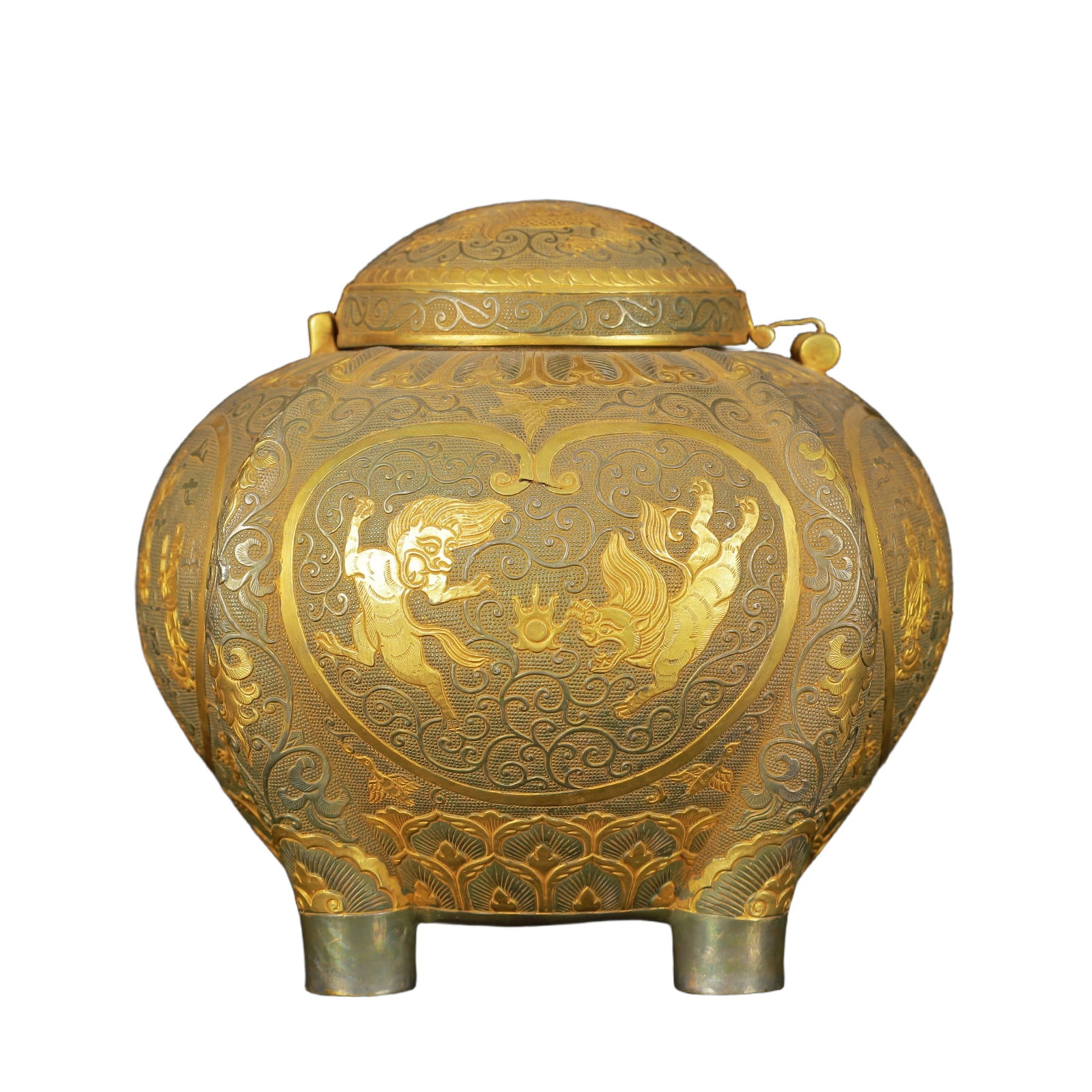 An Exquisite Gilt Silver Figure and Auspicious Beast Pattern Four Legs Cover Jar: An Exquisite Gilt Silver Figure and Auspicious Beast Pattern Four Legs Cover Jar,Tang Dynasty,China,Zhenguan Four-Character Mark,Size:5.5inx4.7inx5.1in,Weight:1000g 银鎏金人