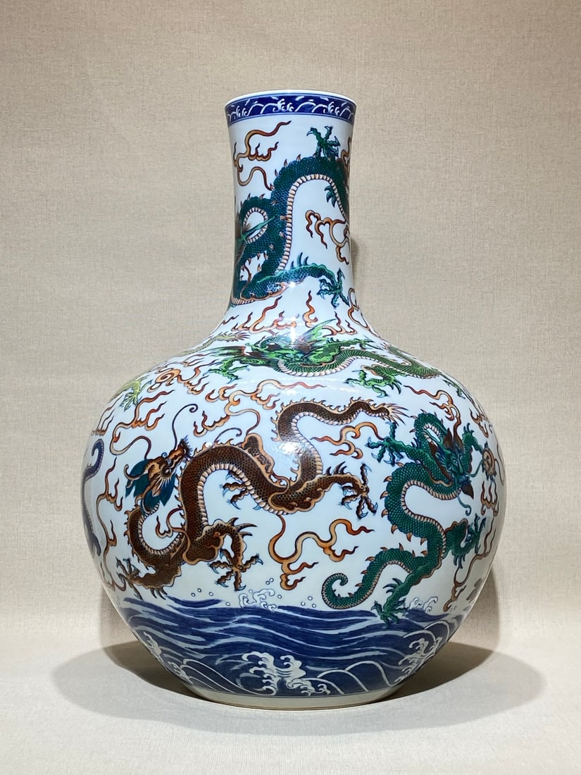 A Huge Blue and White Doucai Seawater and Dragon Pattern Vase: A Huge Blue and White Doucai Seawater and Dragon Pattern Vase,Qing Dynasty,China,Yongzheng Six-character Mark,Size:21.1inx16.5in 青花斗彩海水龙纹瓶