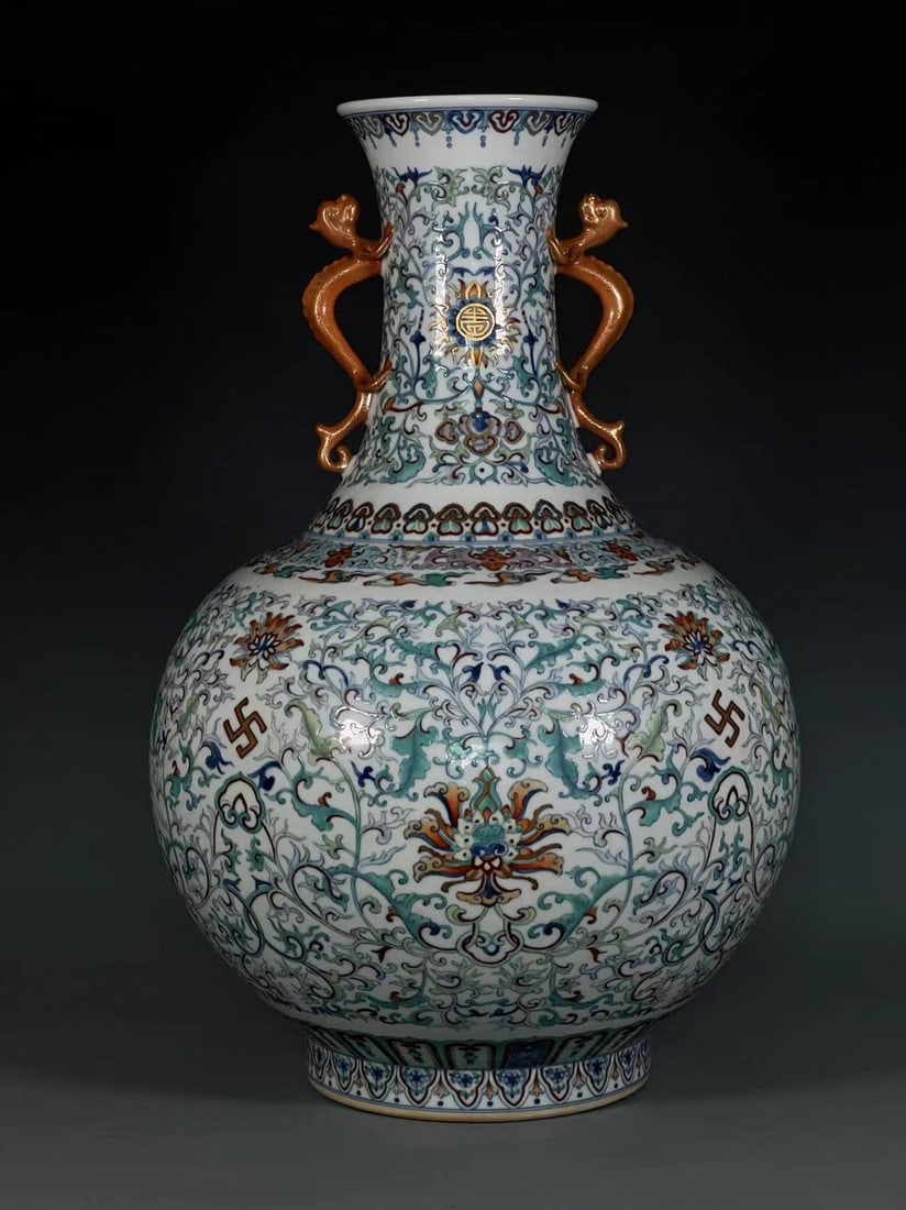 A Huge Doucai Lotus Pattern Dragon-Ears Vase: A Huge Doucai Lotus Pattern Dragon-Ears Vase,Qing Dynasty,China,Qianlong Six-character Mark,Size:20.9inx5.4inx7.4in 斗彩缠枝莲纹龙耳瓶,中
