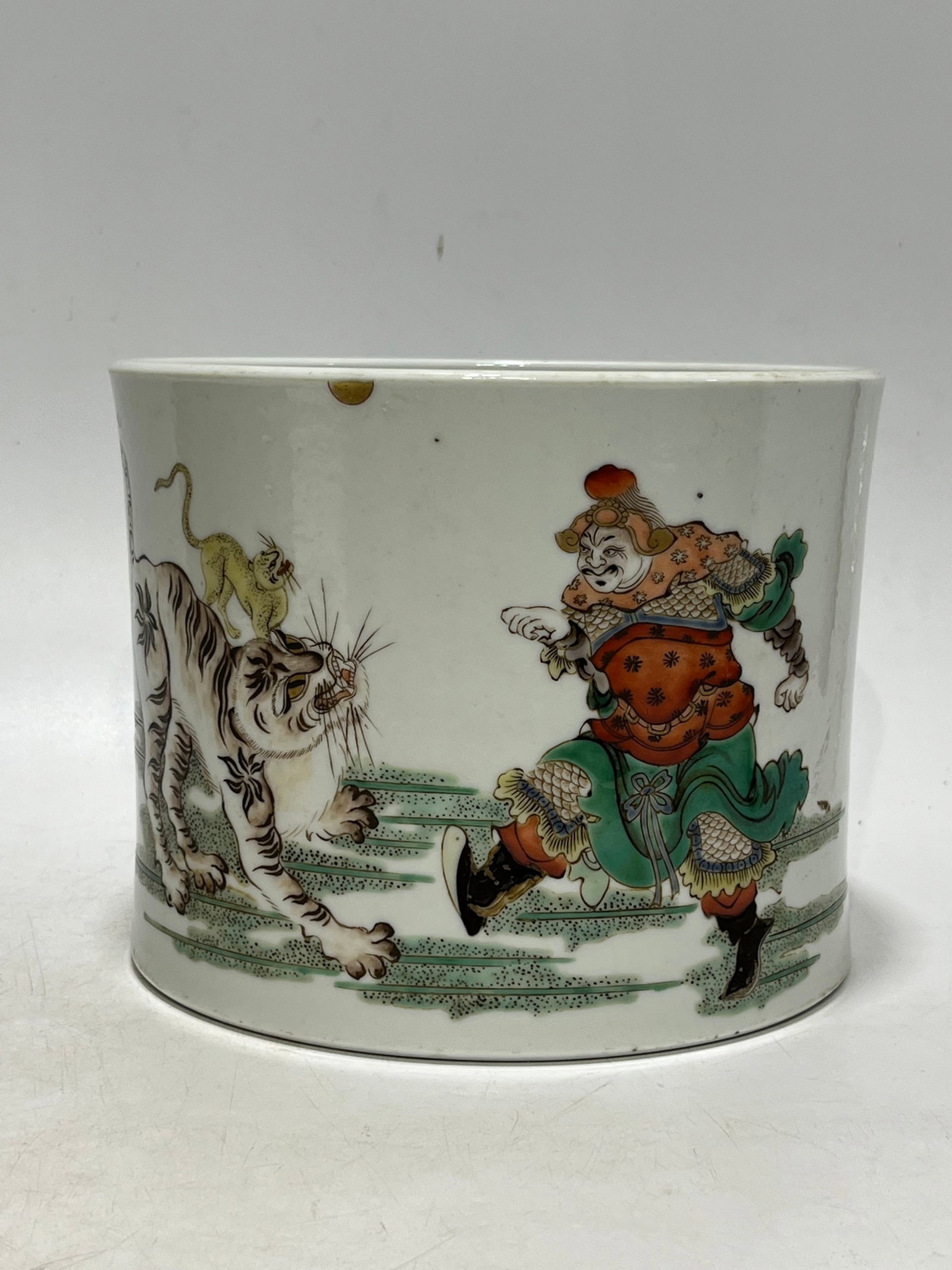 An Exquisite Wucai Figure and Tiger Pattern Brush Pot: An Exquisite Wucai Figure and Tiger Pattern Brush Pot,Qing Dynasty,China,With Mark,Size:7.8in 五彩人物老虎纹笔筒,中国清代,