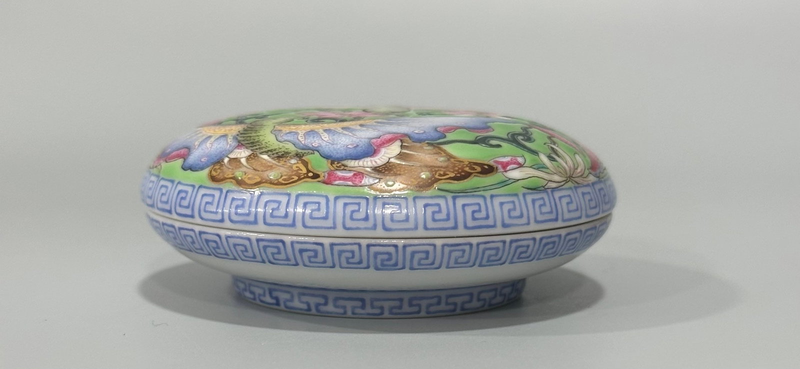 An Exquisite Enamel Flower and Butterfly Pattern Box with Cover: An Exquisite Enamel Flower and Butterfly Pattern Box with Cover,Qing Dynasty,China,Qianlong Four-character Mark,Size:1.2inx2.4in 珐琅彩花卉蝴蝶纹盖