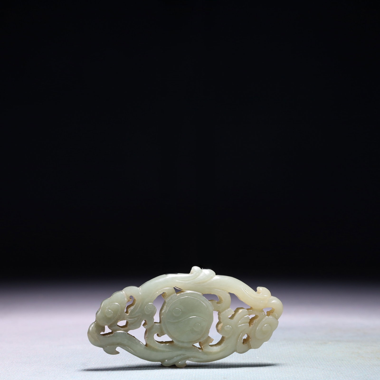 An Exquisite White Jade Trigram Pattern Pendant: An Exquisite White Jade Trigram Pattern Pendant,Qing Dynasty,China,Size:3.1inx1.6in,Weight:42.3g 白玉八卦纹佩,中国清代