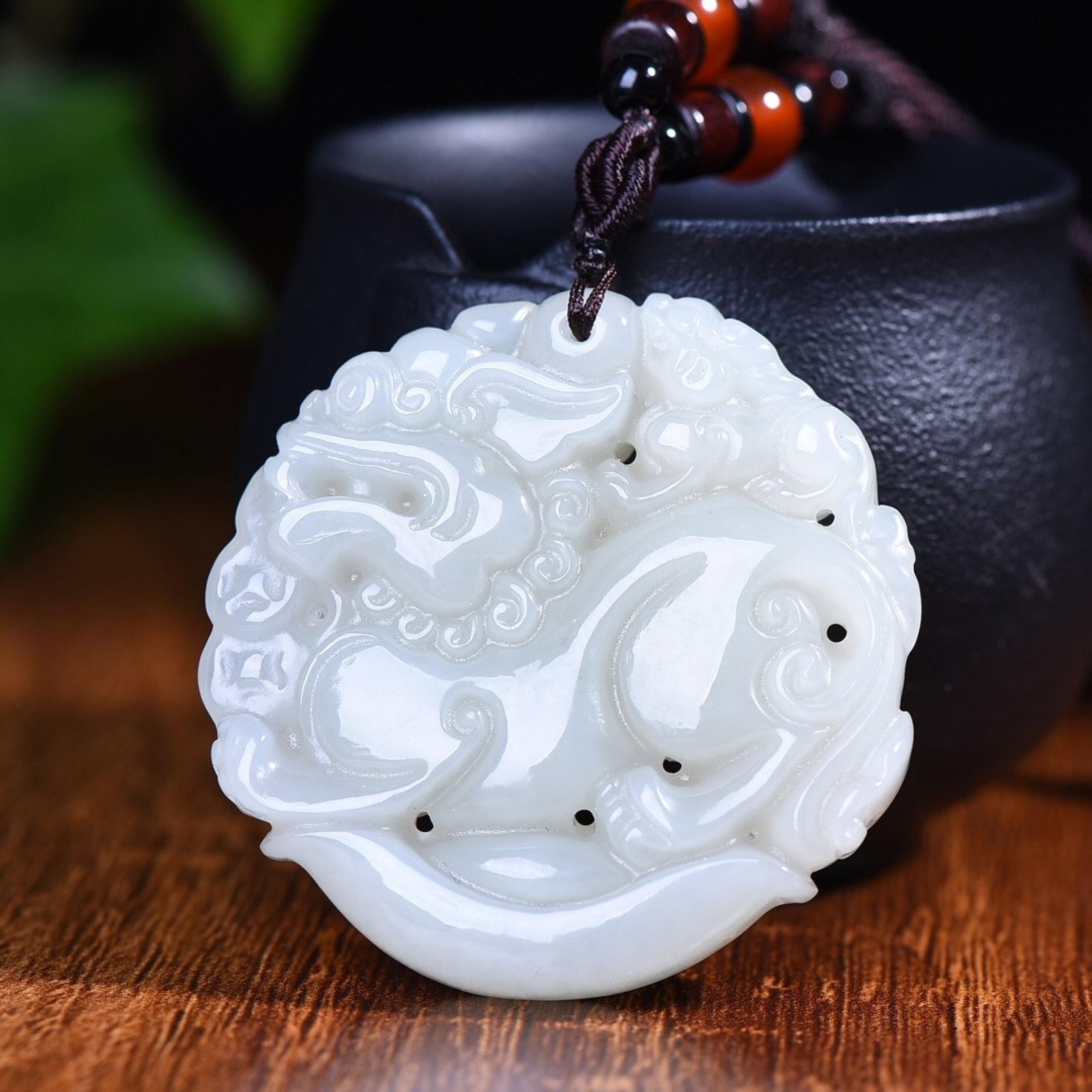 An Exquisite White Jade Wealth-Attracting Creature Pendant: An Exquisite White Jade Wealth-Attracting Creature Pendant,Size:1.9inx1.9in 白玉貔貅挂件