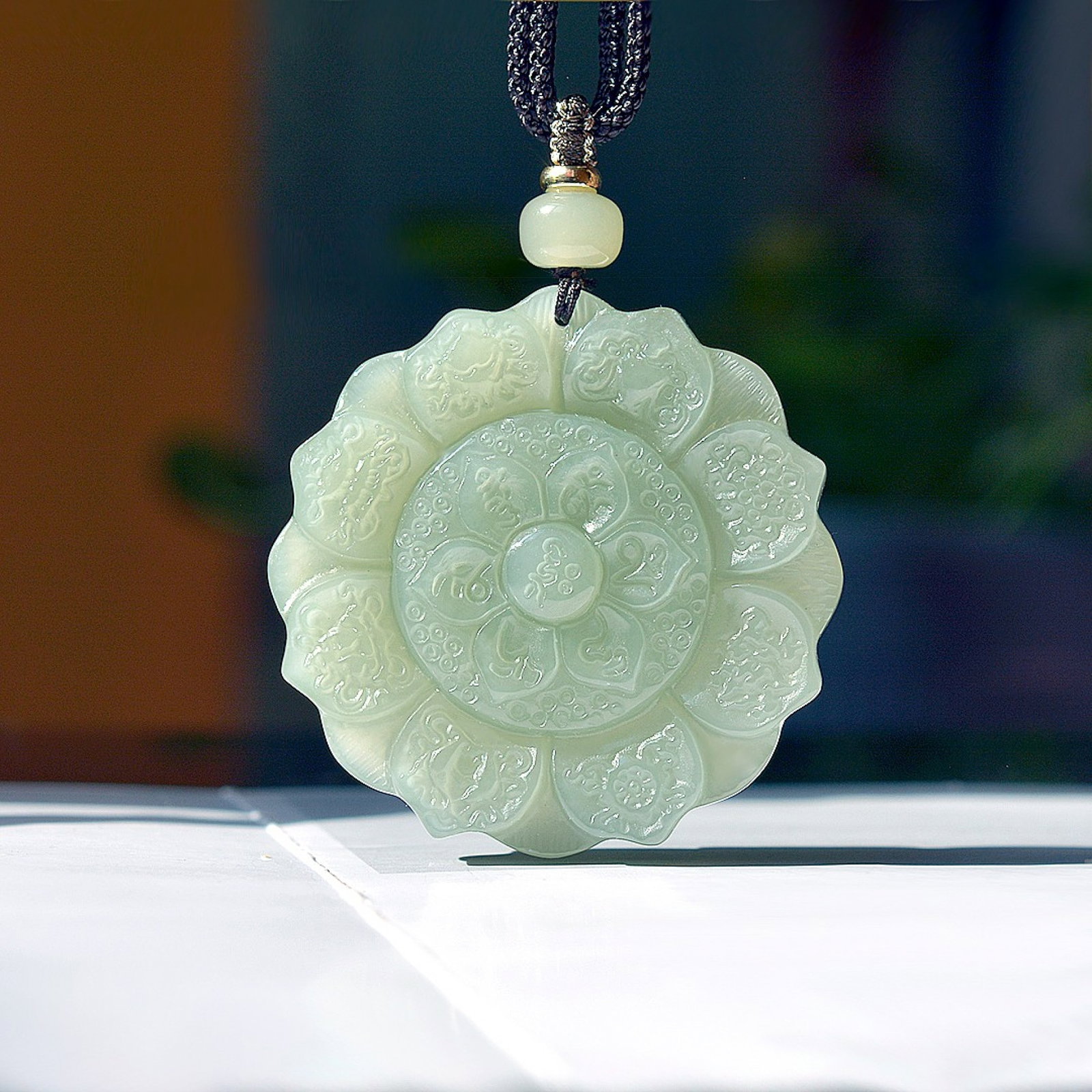 An Exquisite Greenish Jade Pendant (1 of 4)