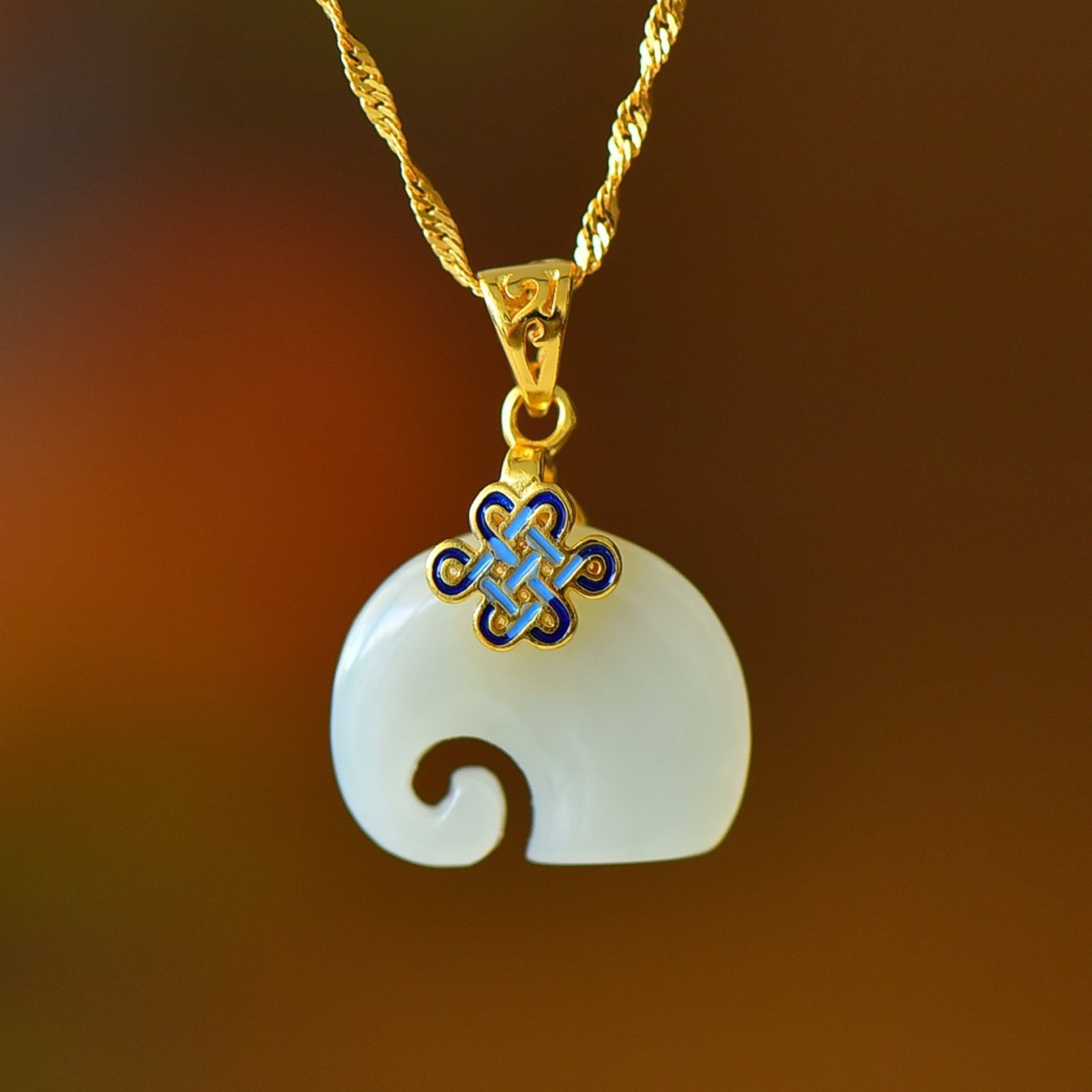 An Exquisite Sterling Silver-Gold Plated Inlaid White Jade Pendant: An Exquisite Sterling Silver-Gold Plated Inlaid White Jade Pendant,Size:0.6inx0.7in 纯银镀金镶白玉吊坠