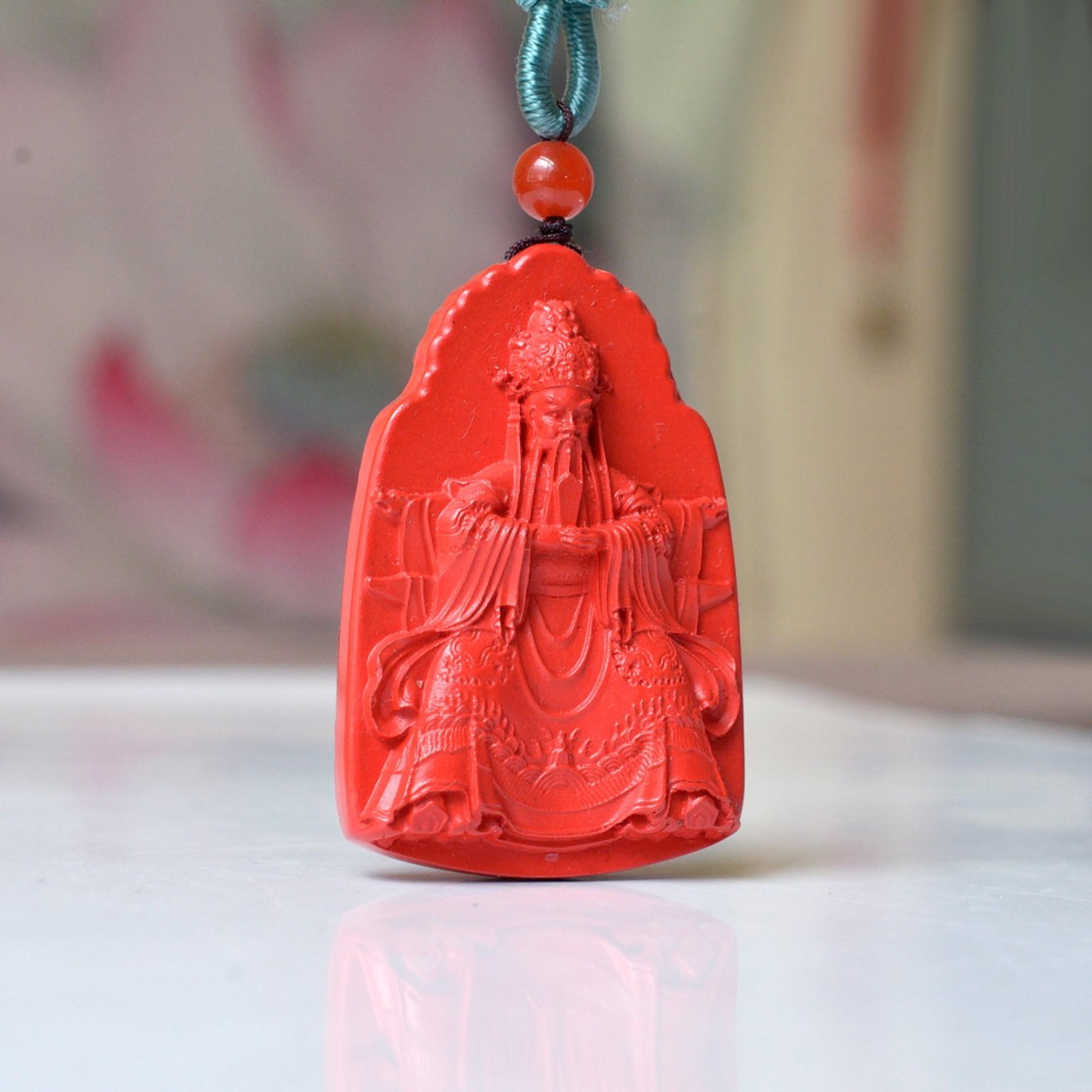 An Exquisite Cinnabar Figure Pattern Pendant (1 of 5)