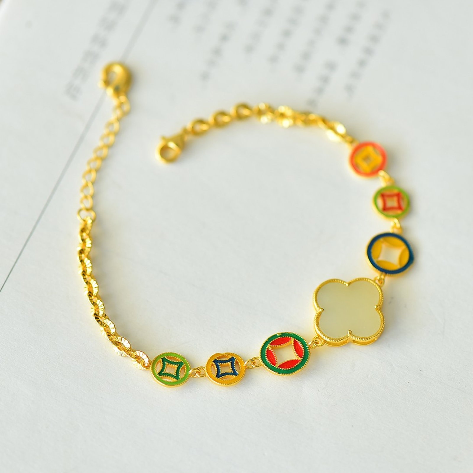 An Exquisite Sterling Silver-Gold Plated Inlaid White Jade Enamel Bracelet: An Exquisite Sterling Silver-Gold Plated Inlaid White Jade Enamel Bracelet 纯银镀金镶白玉珐琅手链