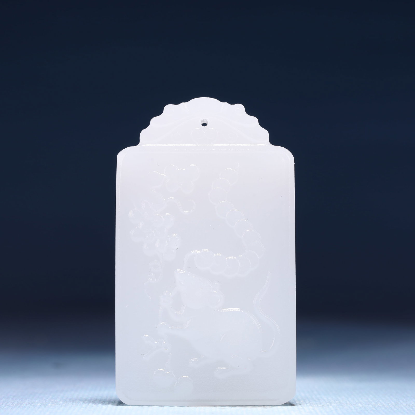 An Exquisite White Jade Mouse Patten Pendant: An Exquisite White Jade Mouse Patten Pendant,Size:1.4inx0.4inx2.4in,Weight:47g 白玉鼠纹牌