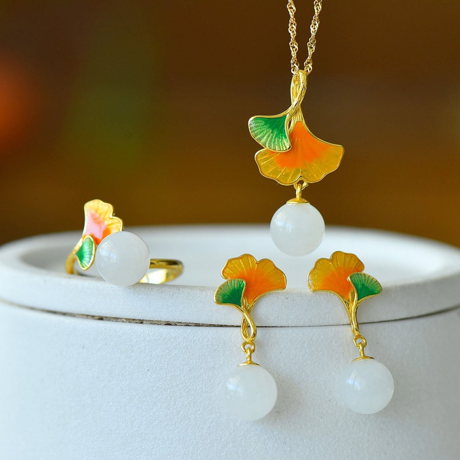 A Set of Fine Sterling Silver-Gold Plated Inlaid White Jade Jewelrys: A Set of Fine Sterling Silver-Gold Plated Inlaid White Jade Jewelrys 一套纯银镀金镶白玉首饰