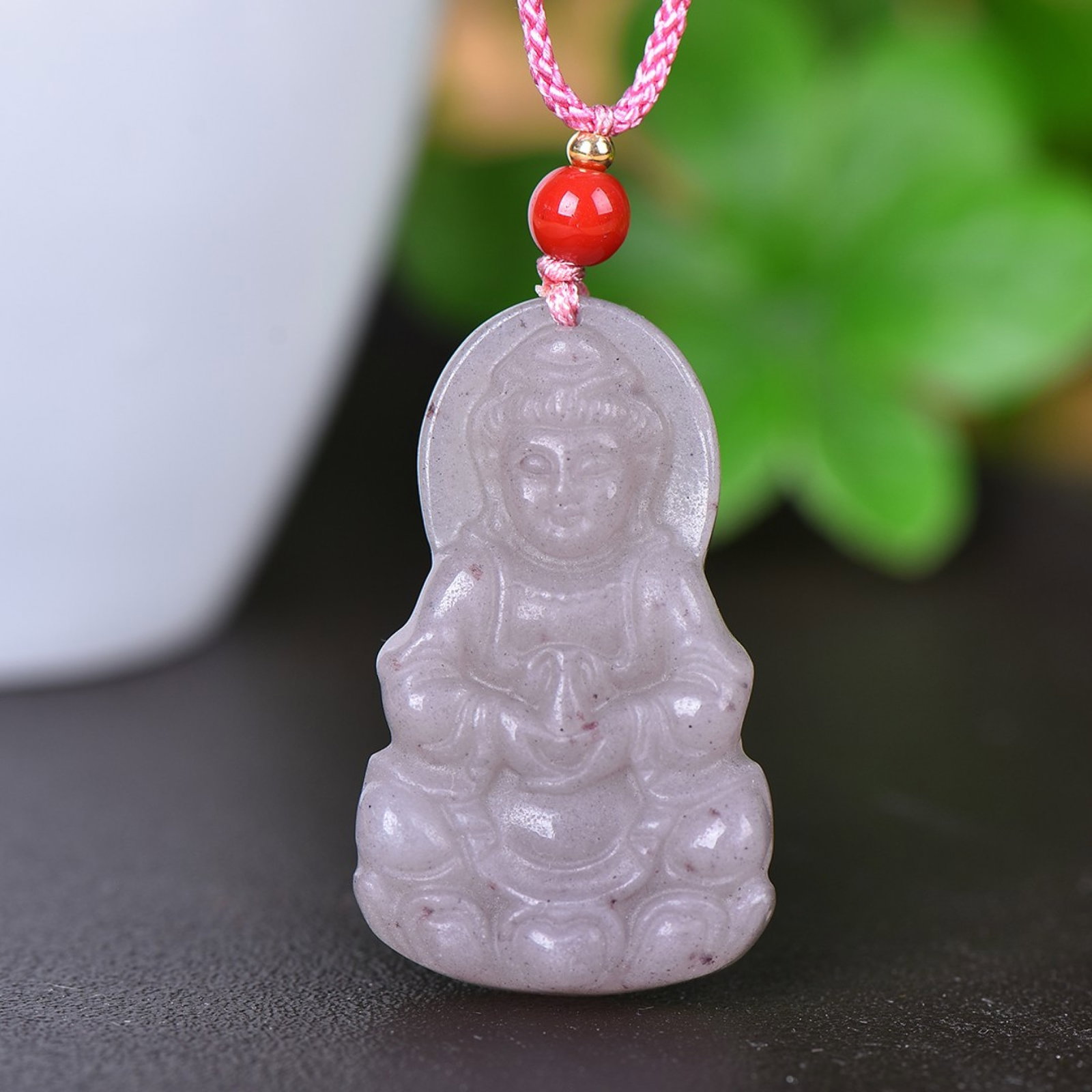 An Exquisite Jadeite Statue of Avalokitesvara Pendant: An Exquisite Jadeite Statue of Avalokitesvara Pendant,Size:1inx1.7in 翡翠观音挂件