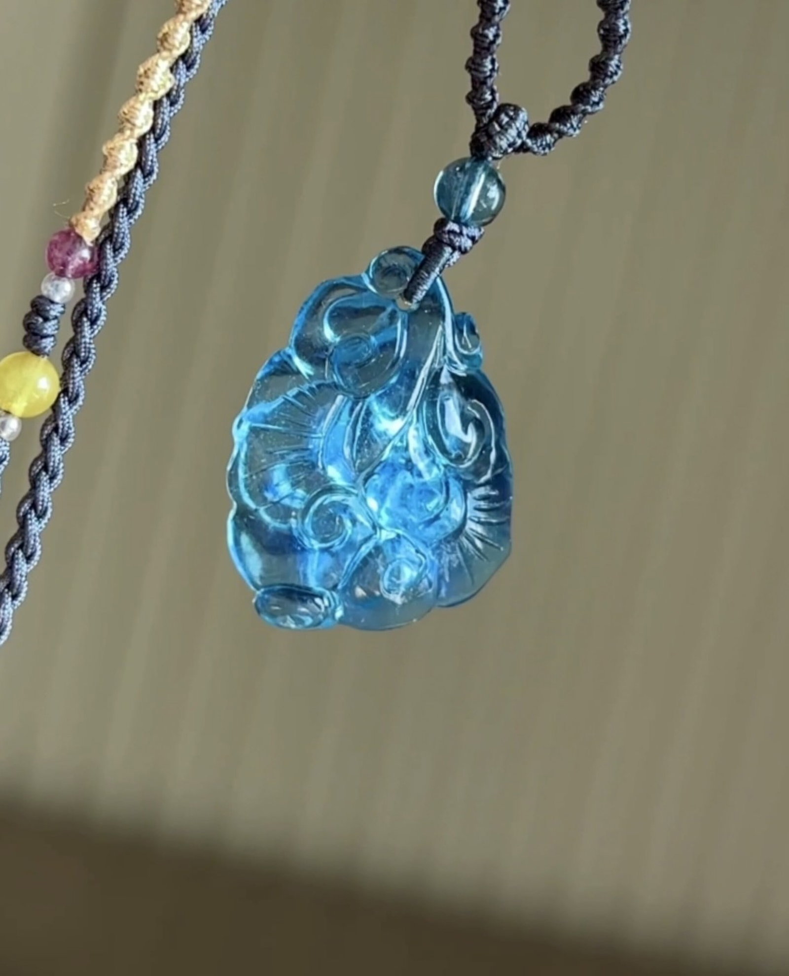 An Exquisite Aquamarine Ruyi Necklace: An Exquisite Aquamarine Ruyi Necklace,Size:1inx0.7inx0.3in,Weight:5.4g 海蓝宝如意吊坠