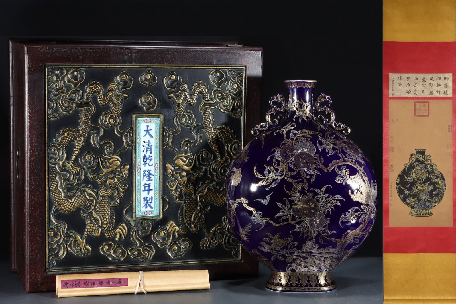 An Exquisite Ji Blue Glazed Painted Gold Melon and Fruit Pattern Double-Ears Vase,with Chinese: An Exquisite Ji Blue Glazed Painted Gold Melon and Fruit Pattern Double-Ears Vase,with Chinese Vertical Scroll Ink Painting on Silk,Qing Dynasty,China,Qianlong Six-character Mark,Size:(Without frame)2